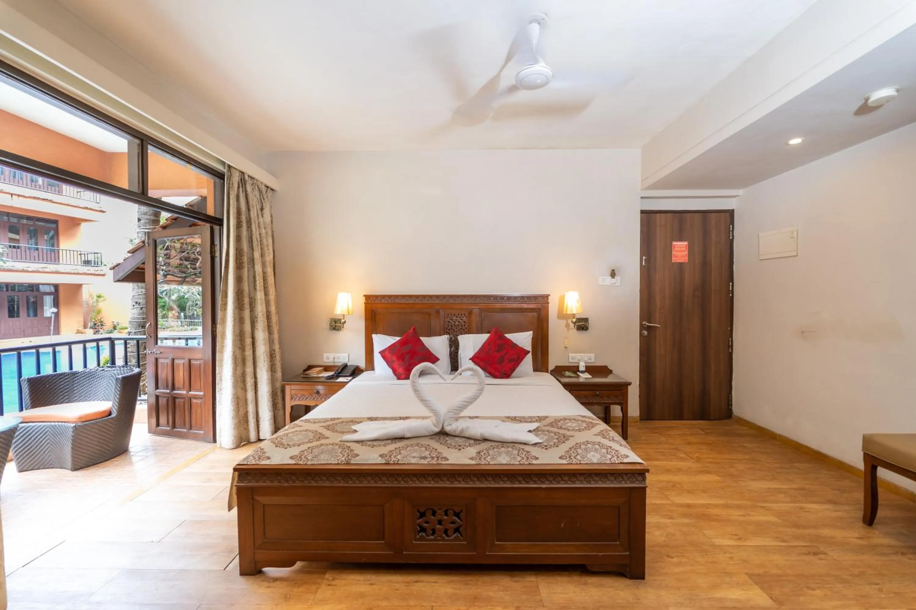 Bed in Neelam's The Grand Hotel Goa