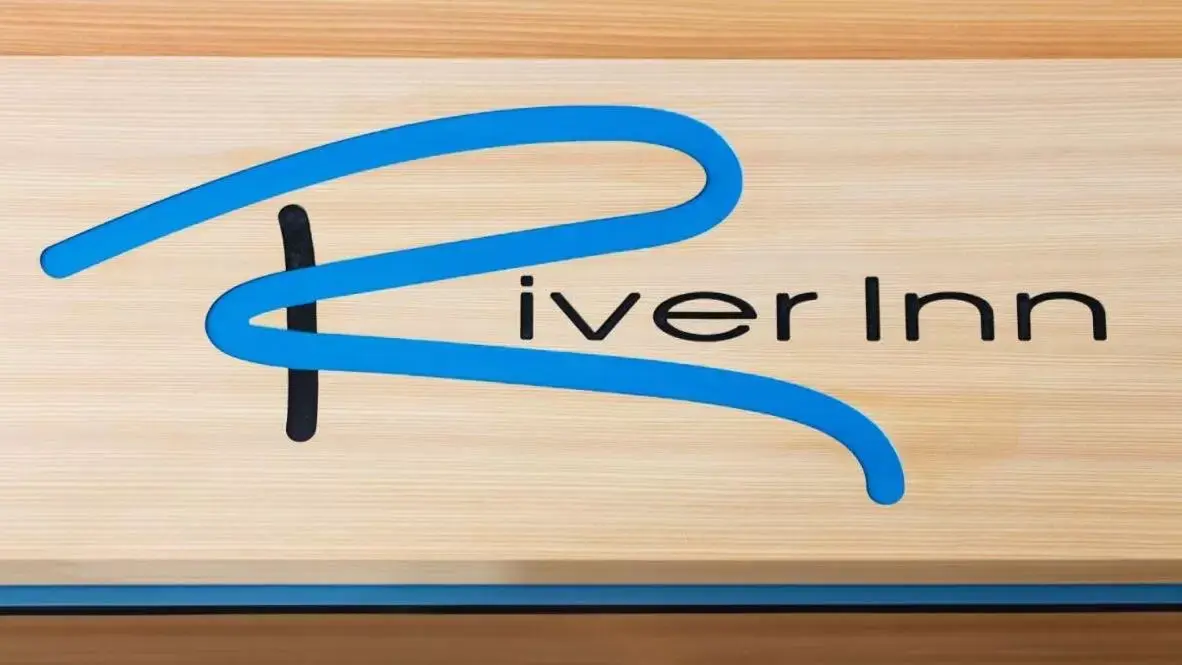 Property logo or sign in b&b River Inn