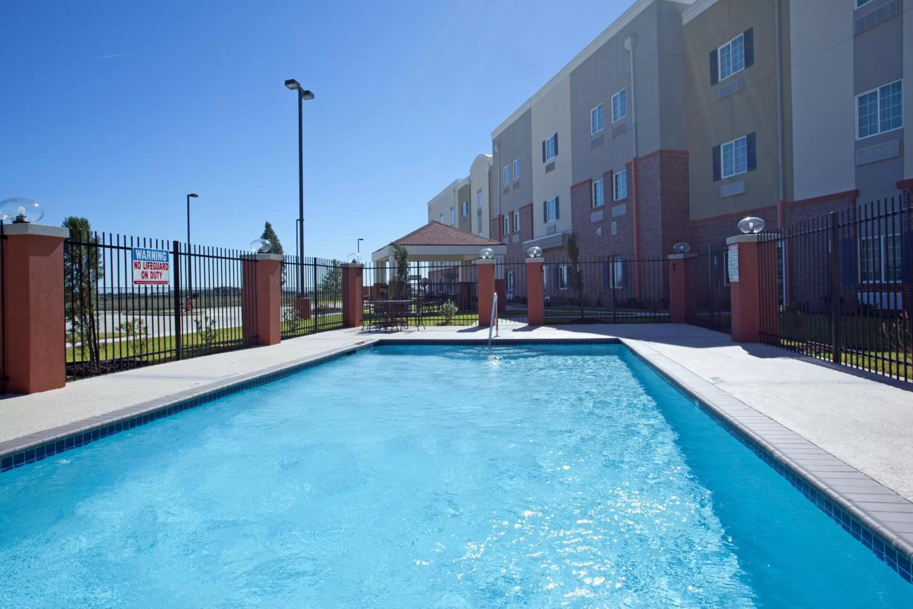 Swimming pool in Candlewood Suites League City by IHG