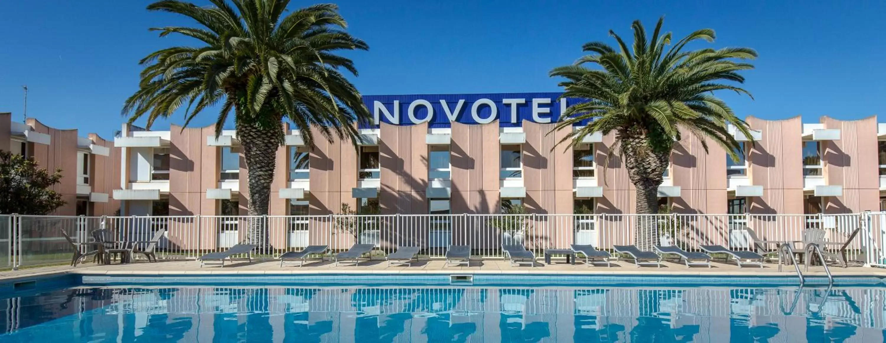 Swimming Pool in Novotel Perpignan Nord Rivesaltes