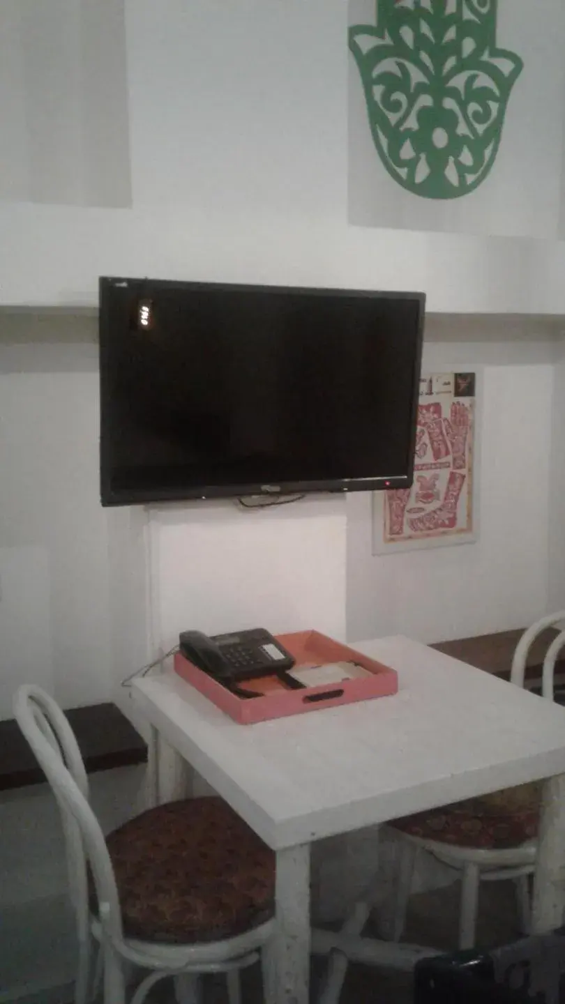 TV and multimedia, TV/Entertainment Center in XVA Art Hotel
