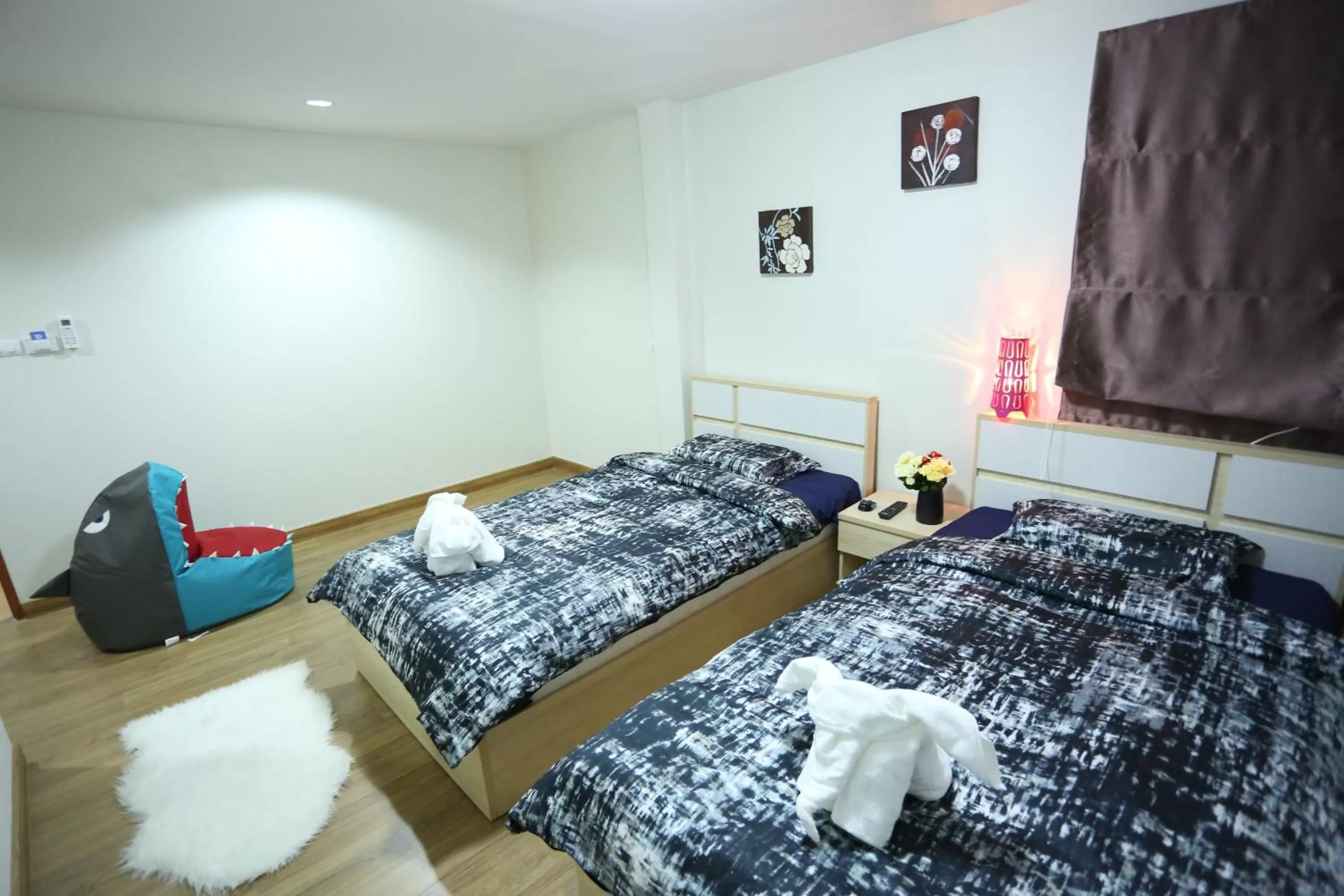 Photo of the whole room, Bed in TD Bangkok