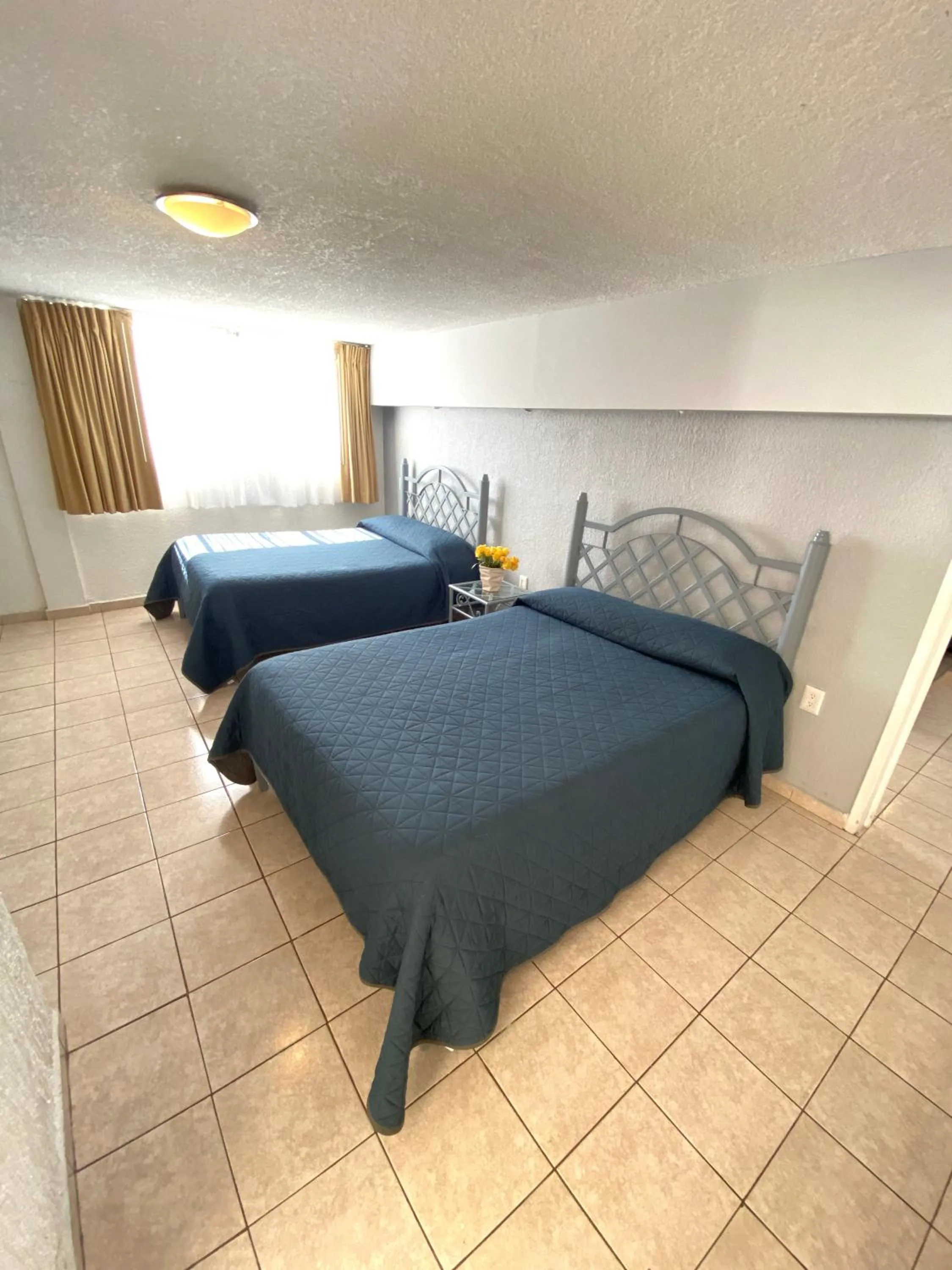 Bed in Hotel Qualitel Plus