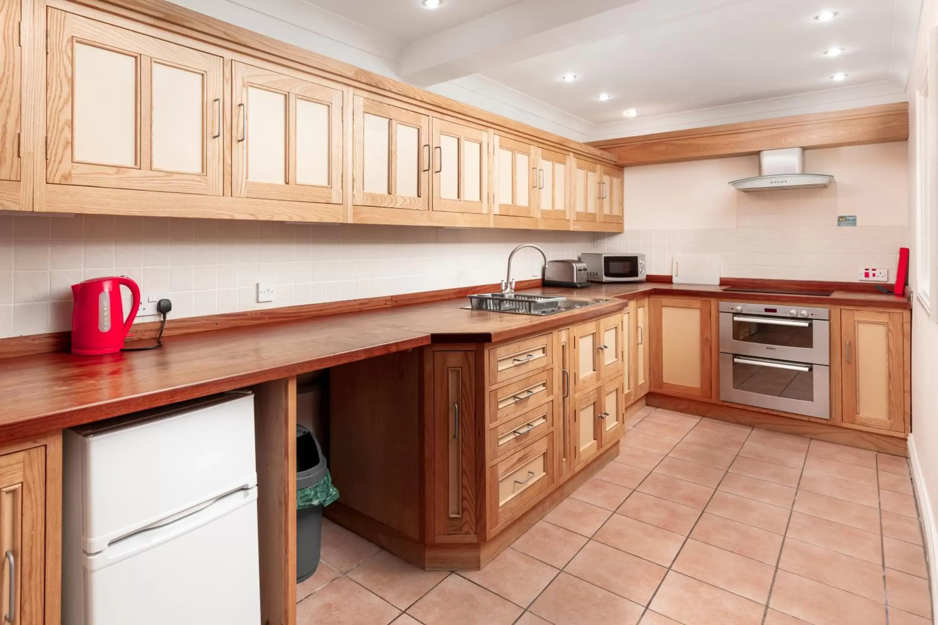 Kitchen/Kitchenette in Discovery Accommodation