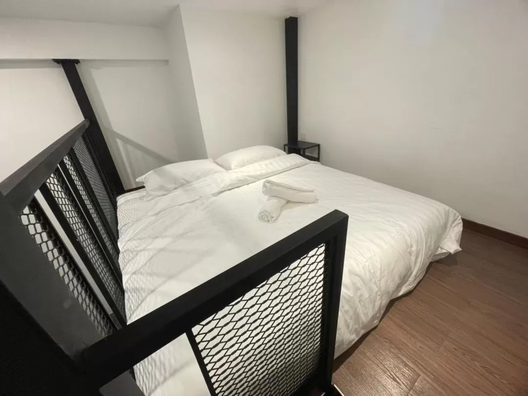 Bed in The Magazine Boutique Hotel