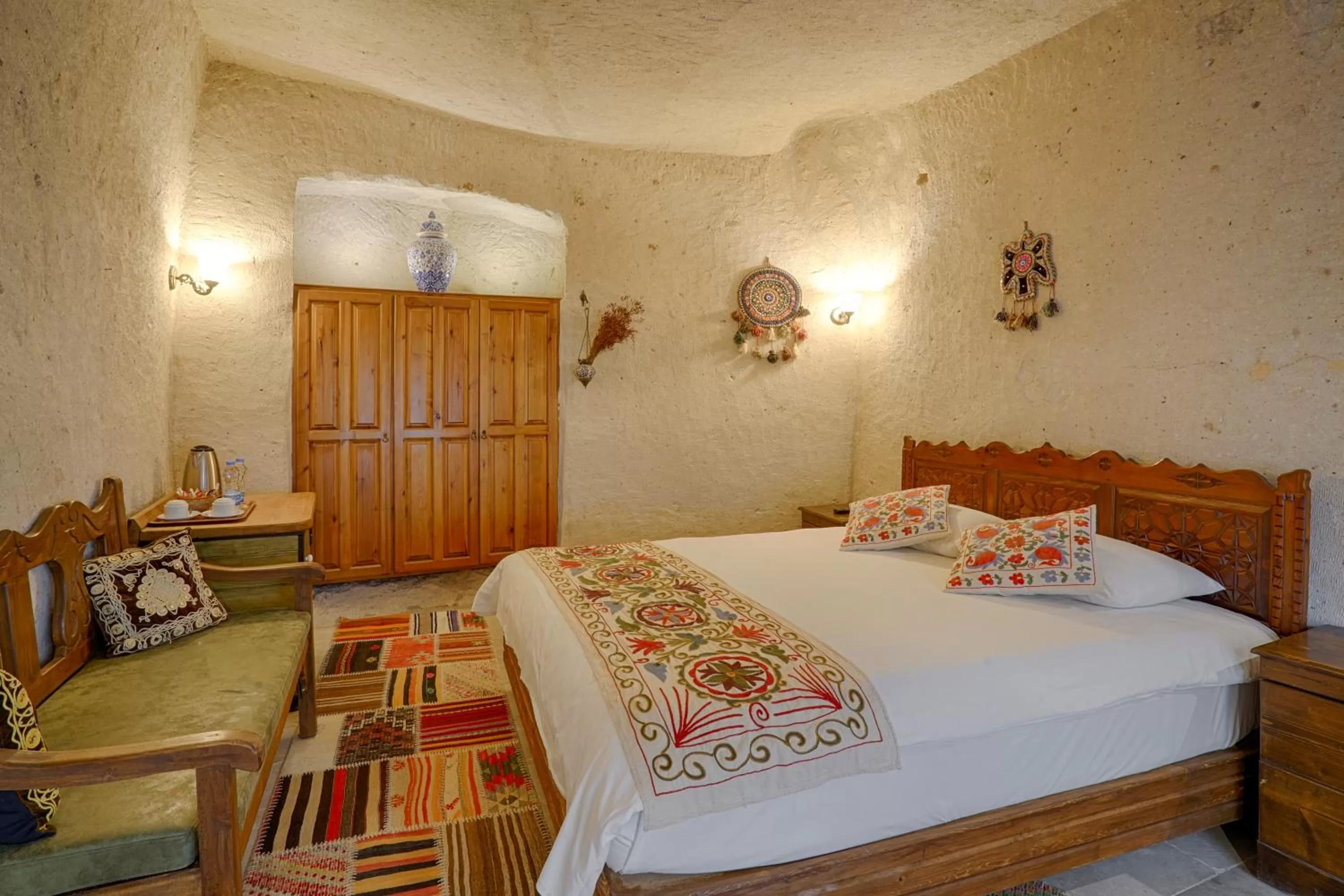 Bed in Tulip Cave Suites
