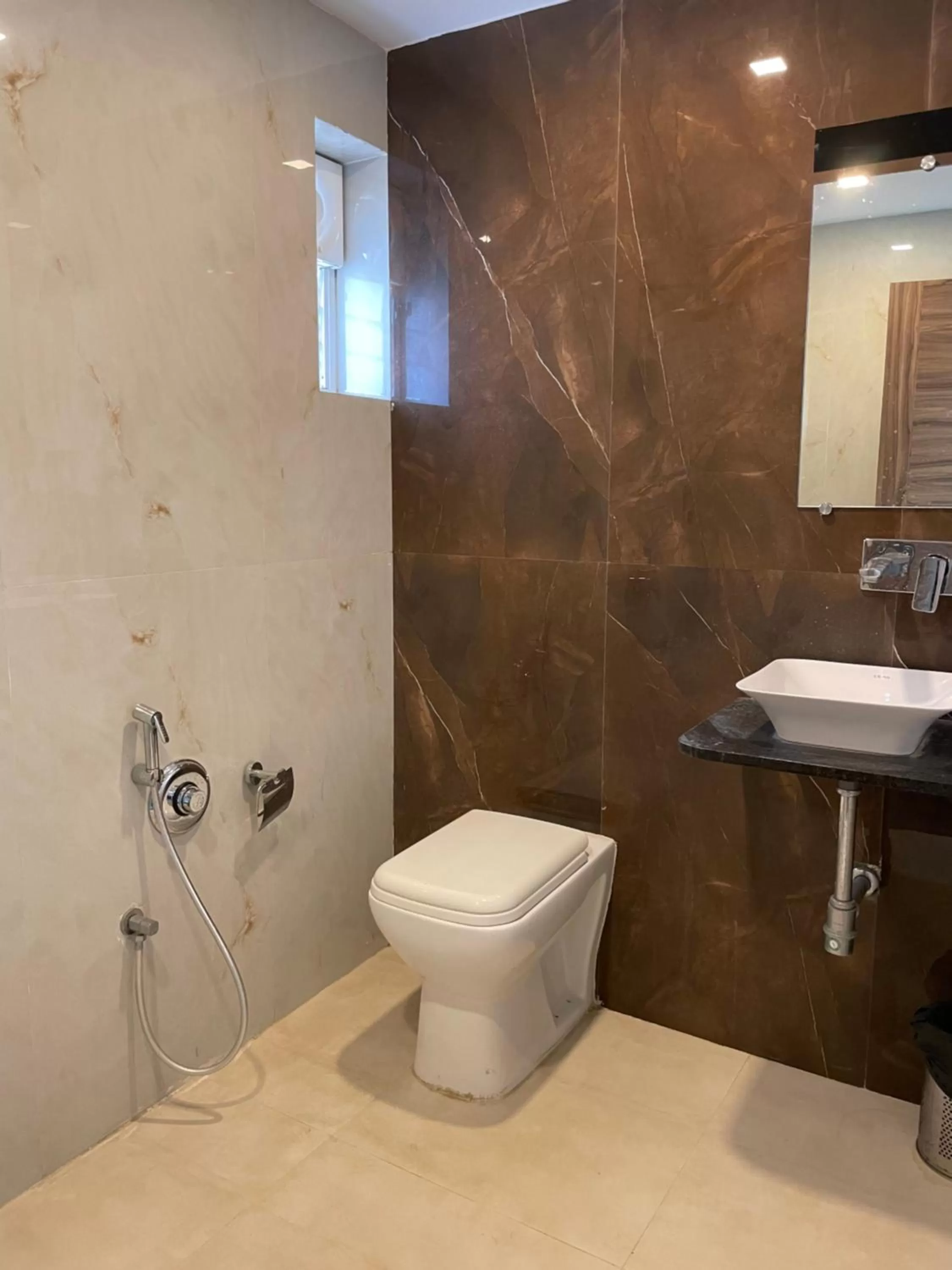 Bathroom in Manomay Homes