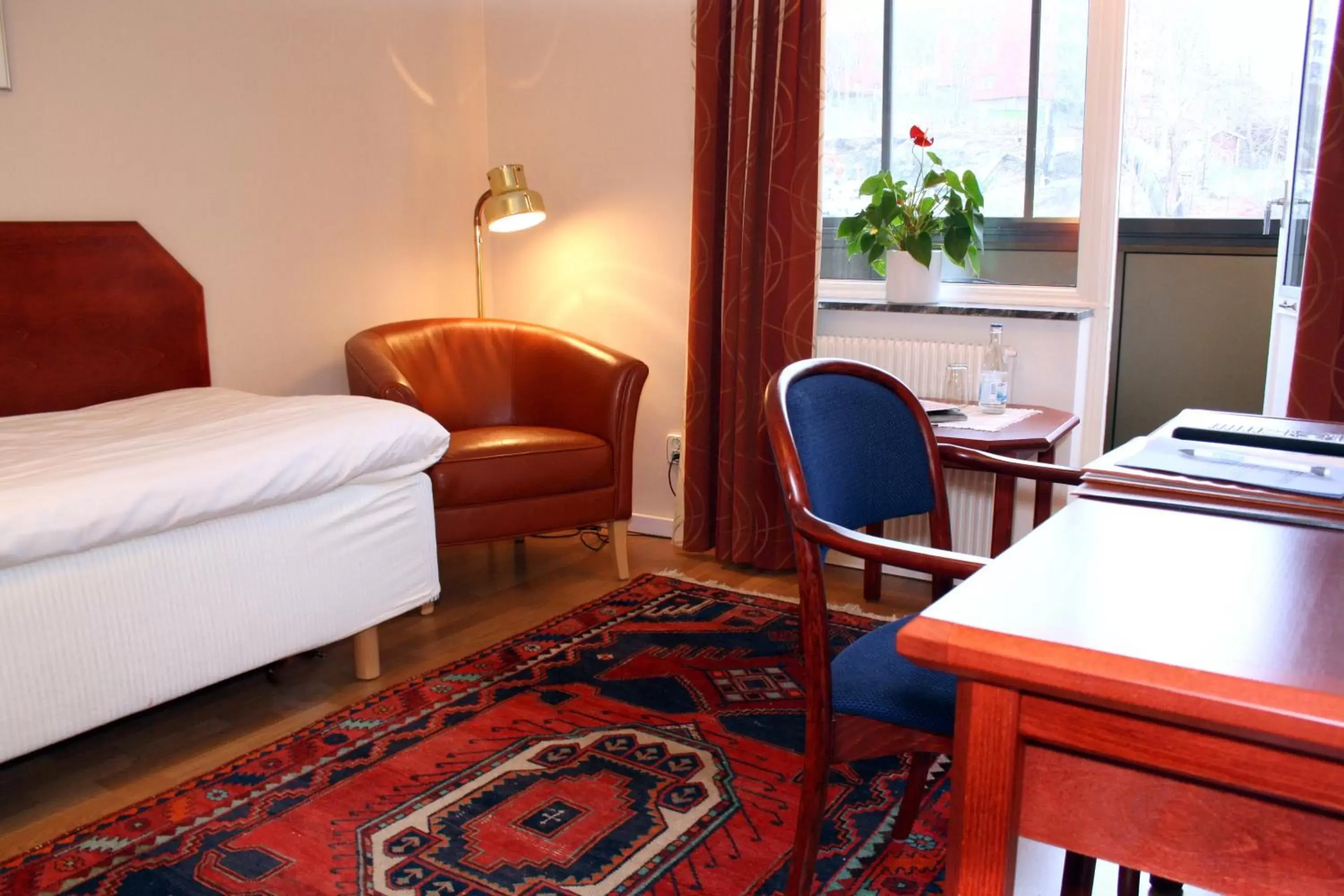 Bed, Seating Area in Hotel Örgryte