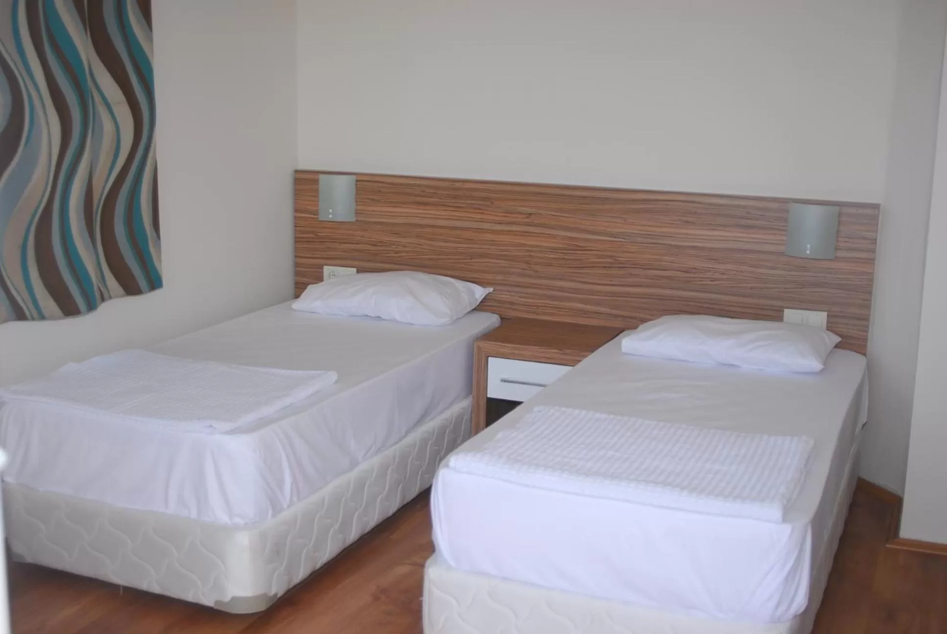 Bed in Yucesan Hotel