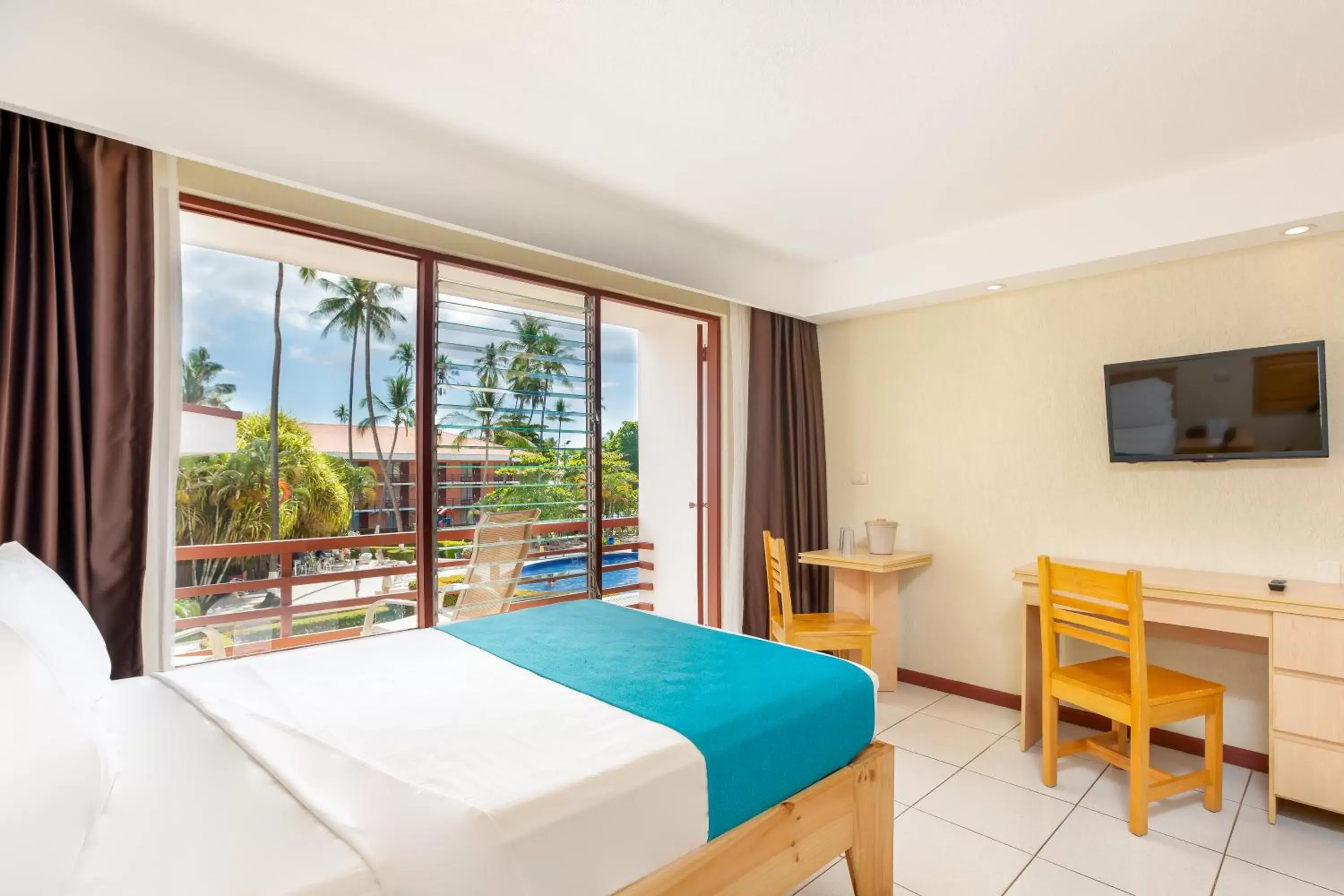 Bedroom in Best Western Jaco Beach All Inclusive Resort