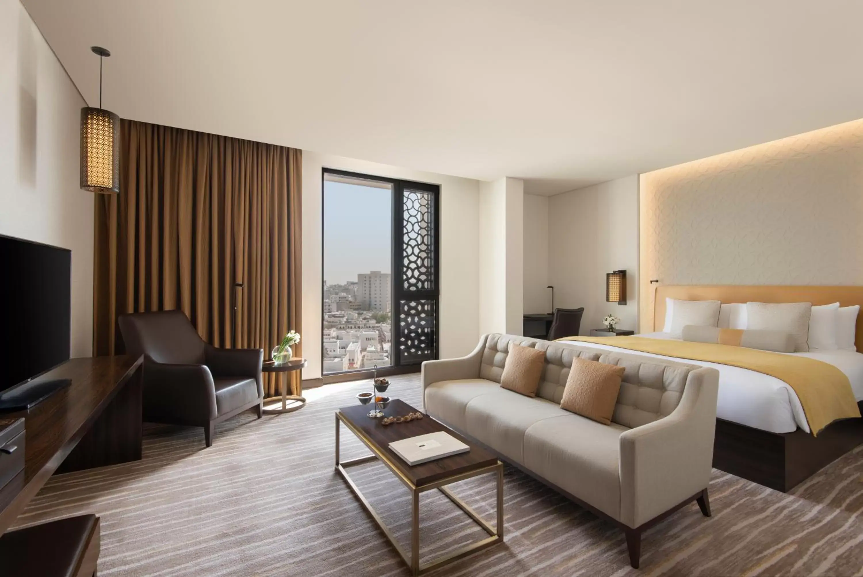 Bedroom, Seating Area in Alwadi Hotel Doha - MGallery