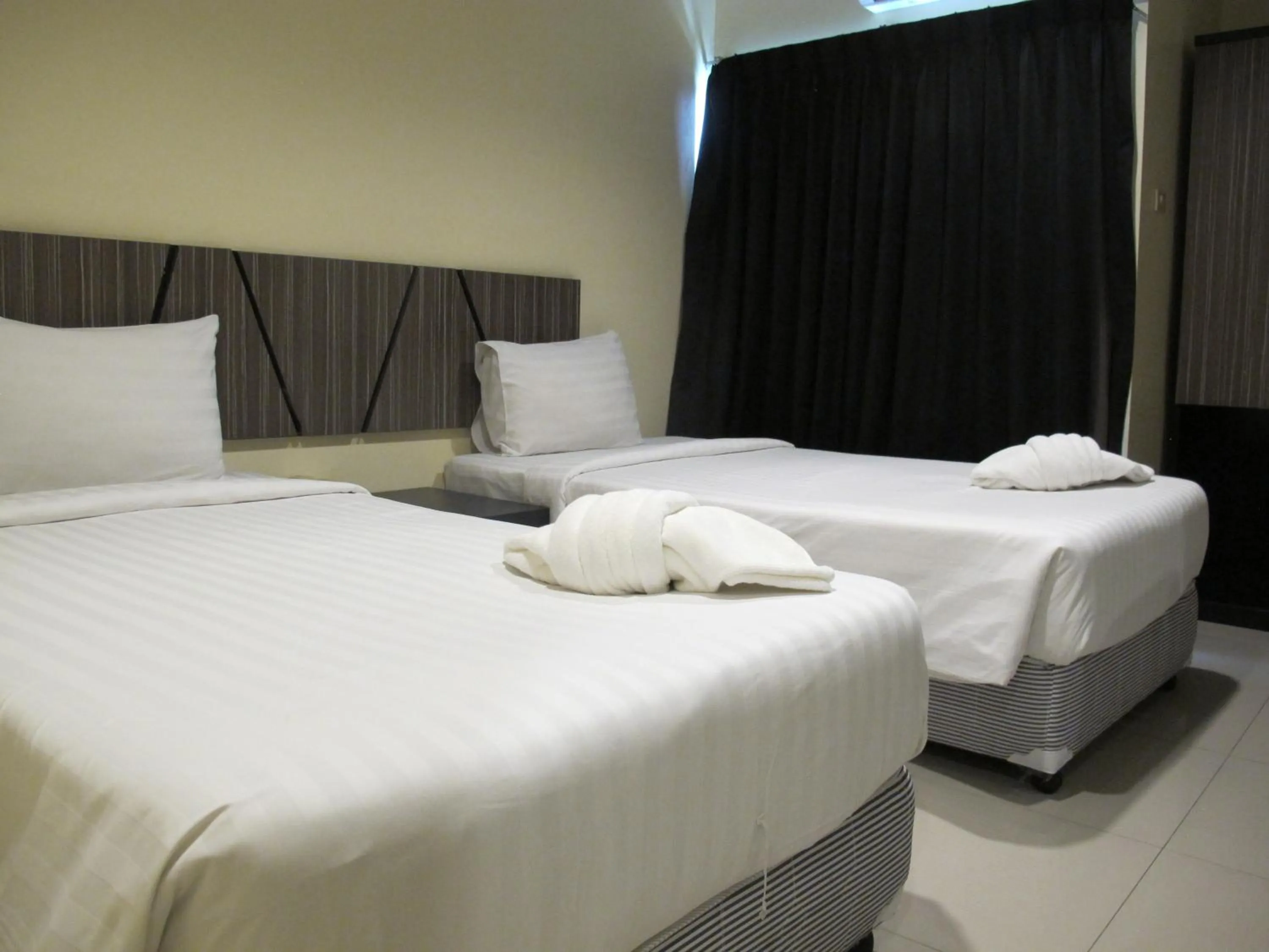 Bed in AIRY Suvarnabhumi Hotel