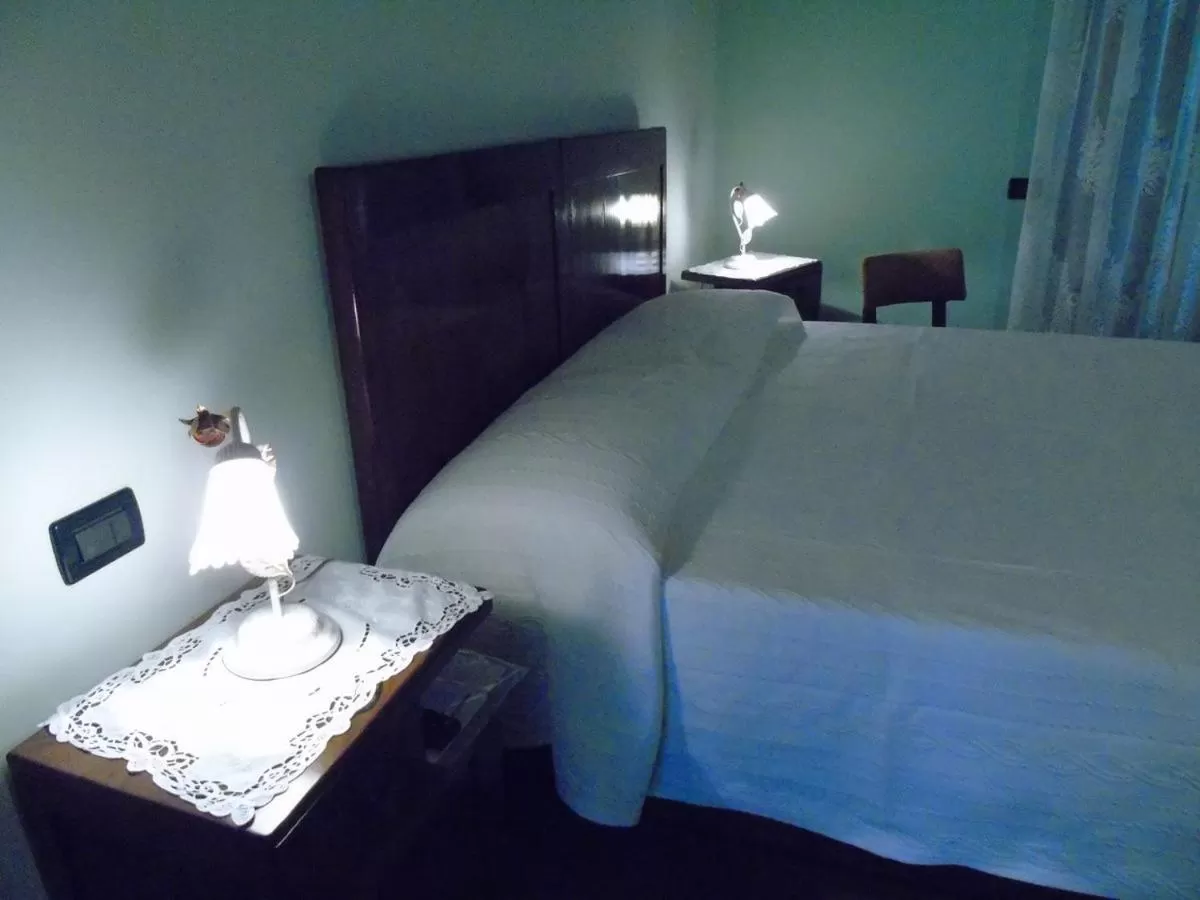 Bed in B&B Ai Cipressi