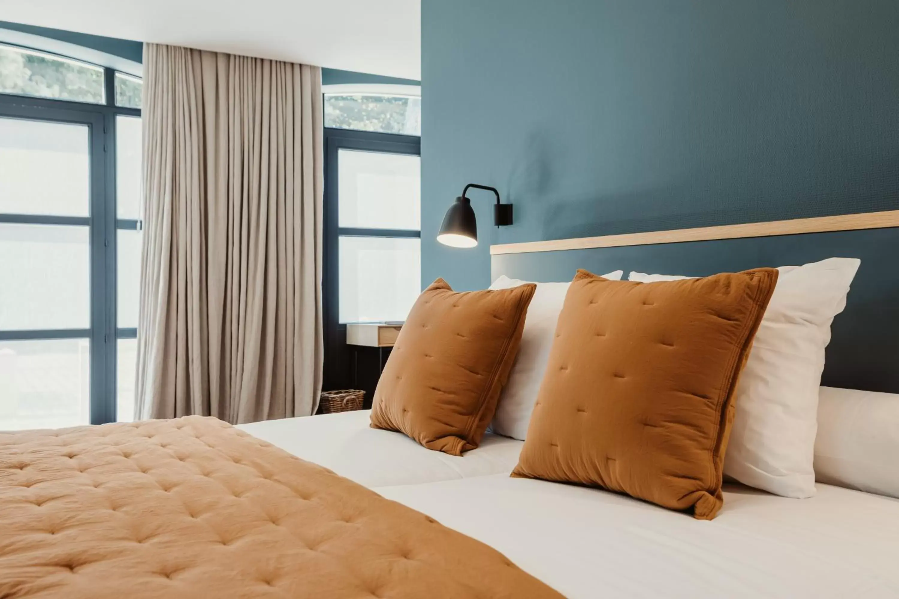 Bed in Auberge du Pêcheur Bed in Auberge du Pêcheur