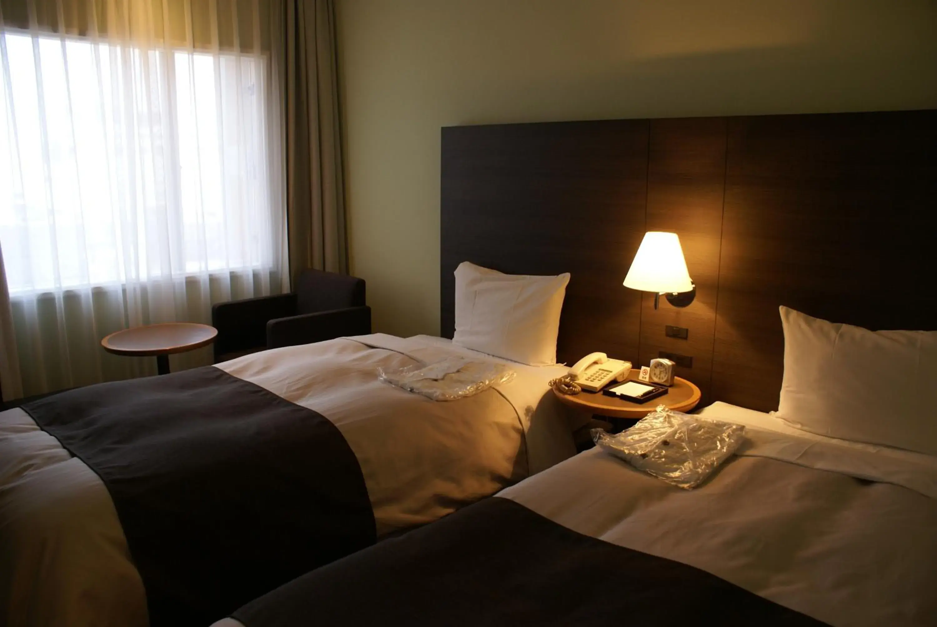 Bed in Ginza Grand Hotel