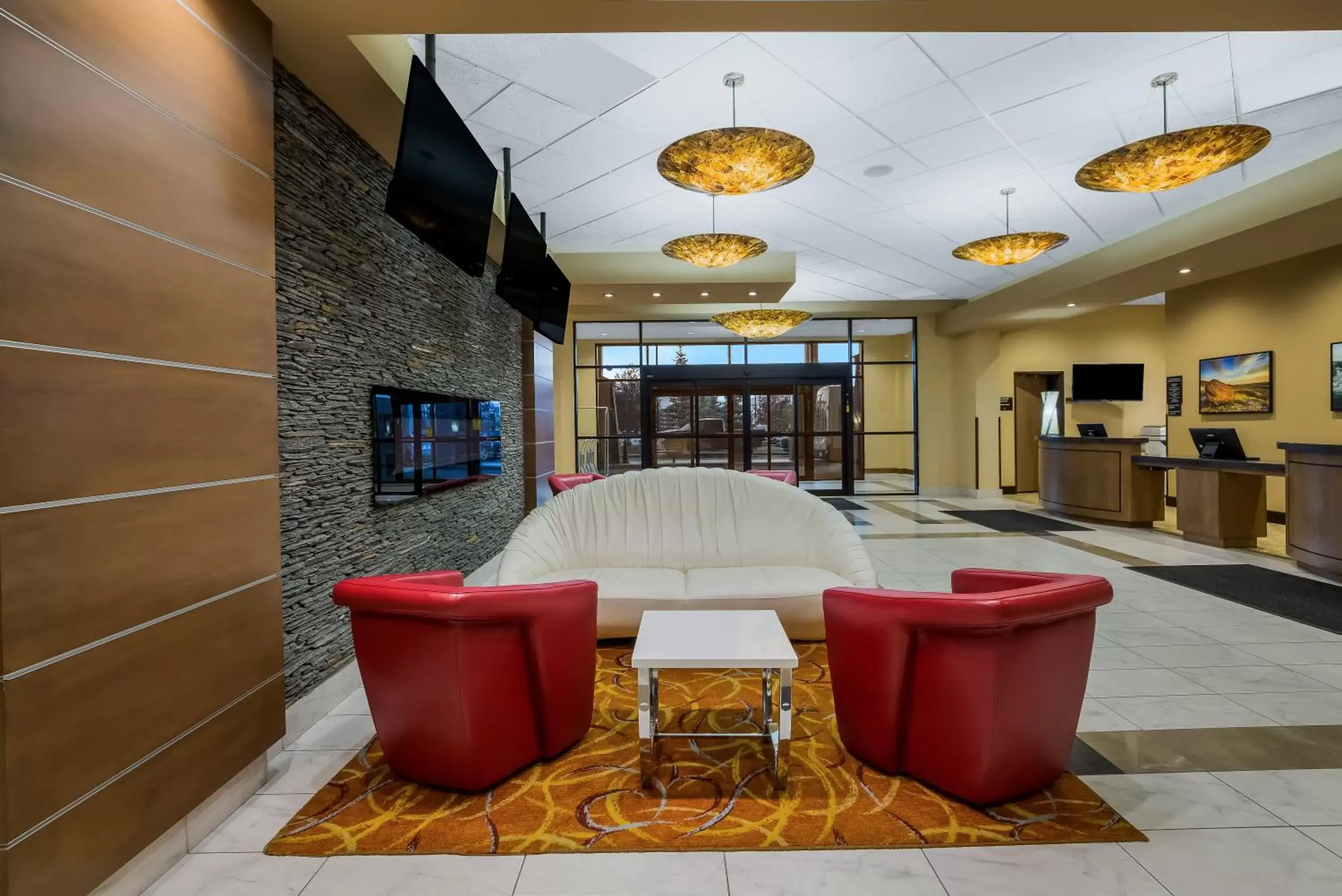 Lobby or reception in Hotel 11 by Sonesta
