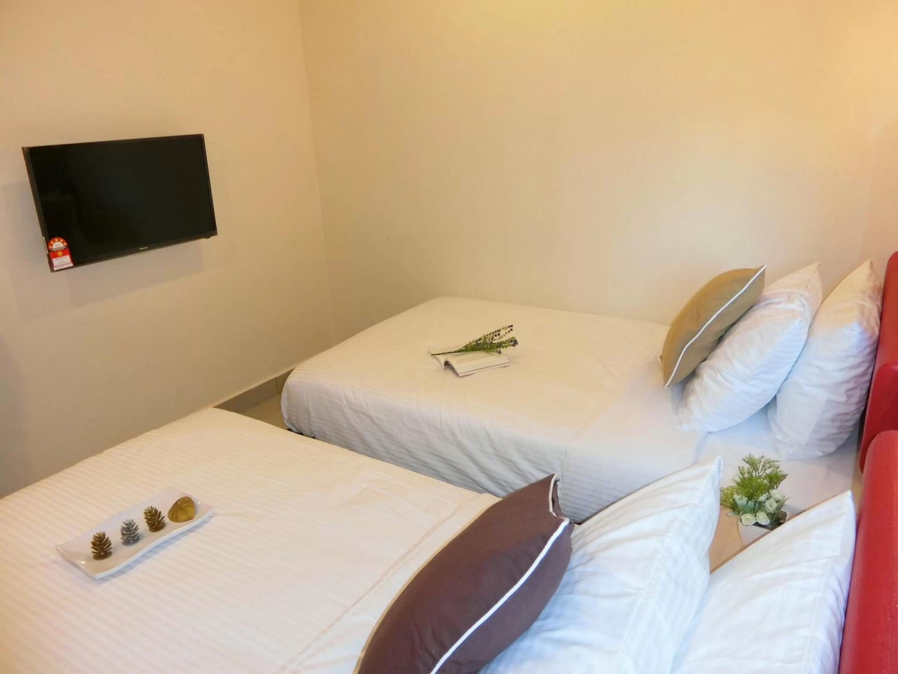 Bed in Carlsun Hotel