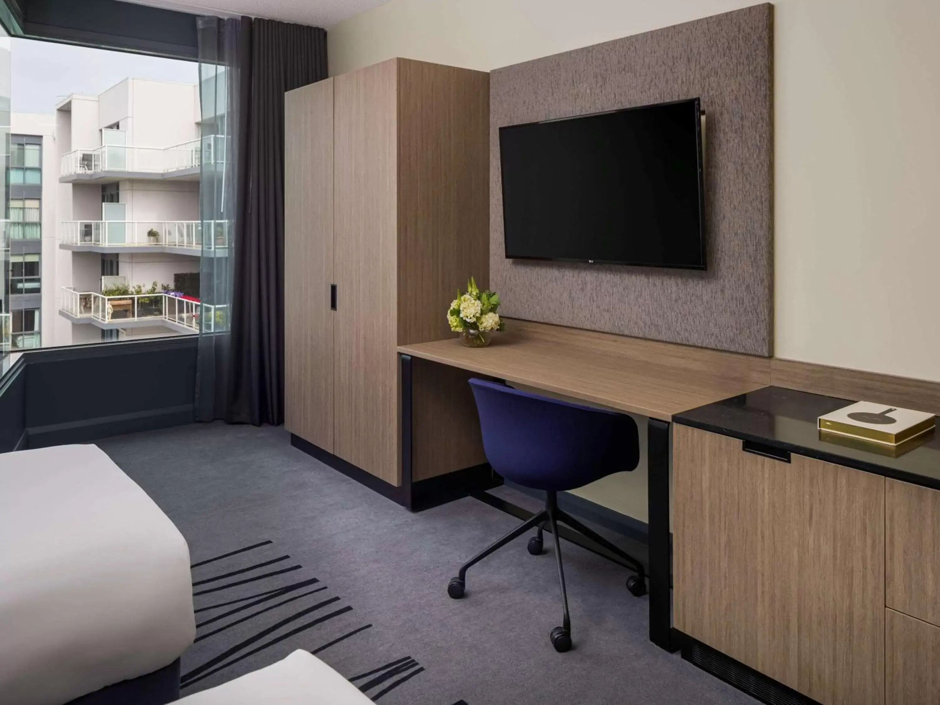 Photo of the whole room, TV/Entertainment Center in Novotel Geelong