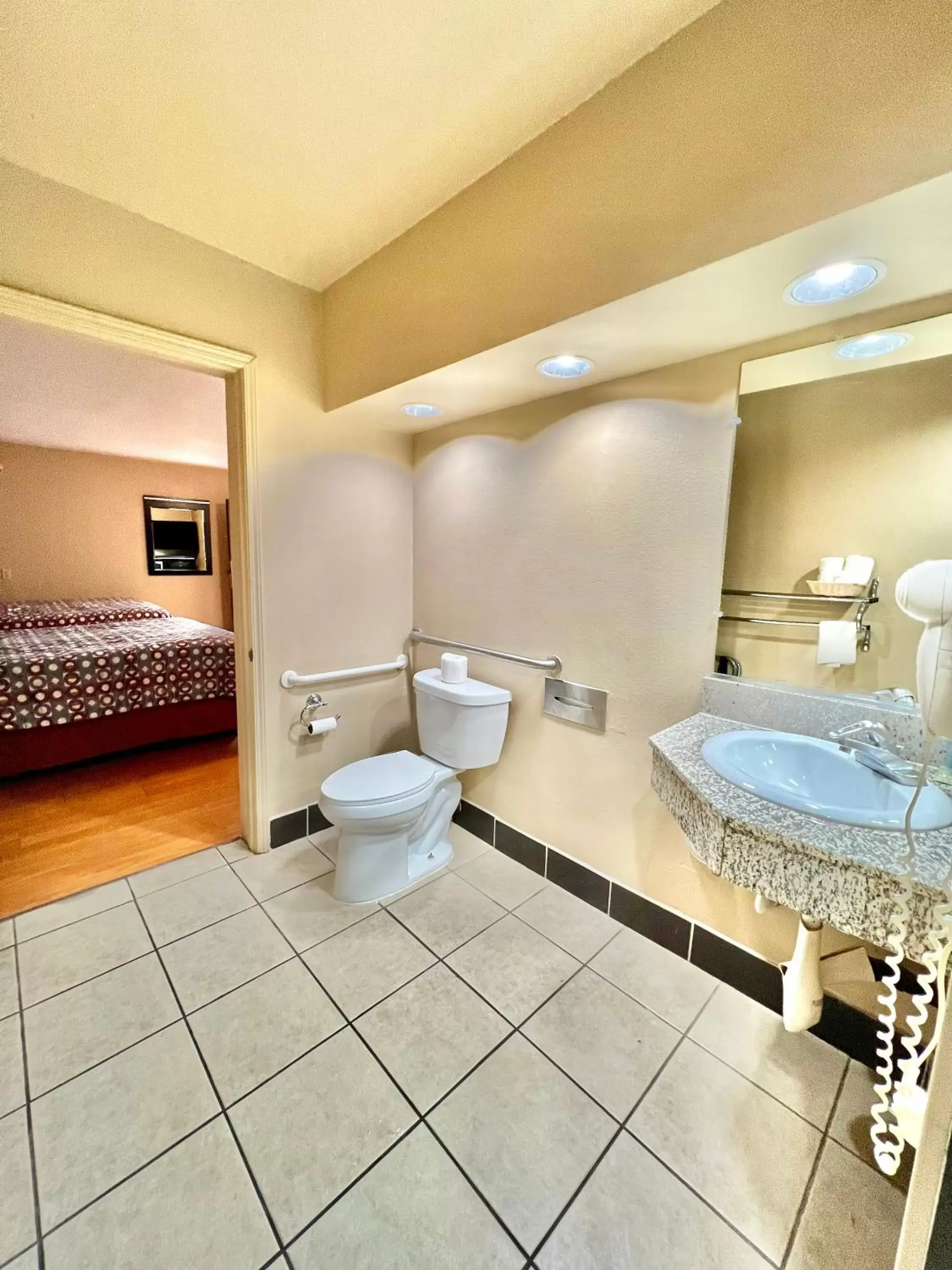 Toilet, Bathroom in Super 8 by Wyndham Pasadena/LA Area