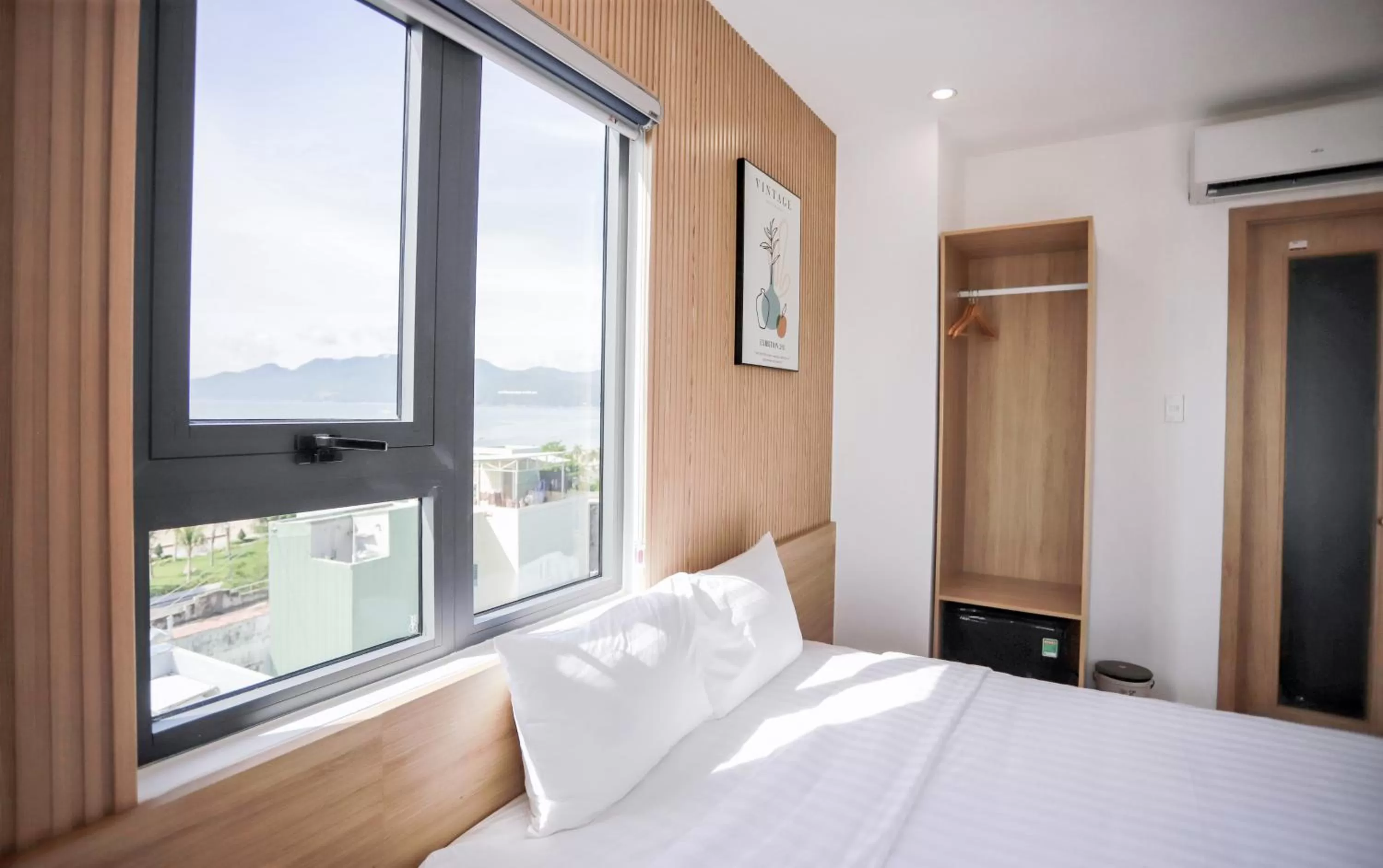 View (from property/room), Bed in HAKU Boutique Hotel Quy Nhơn Kim Đồng - Xuân Diệu