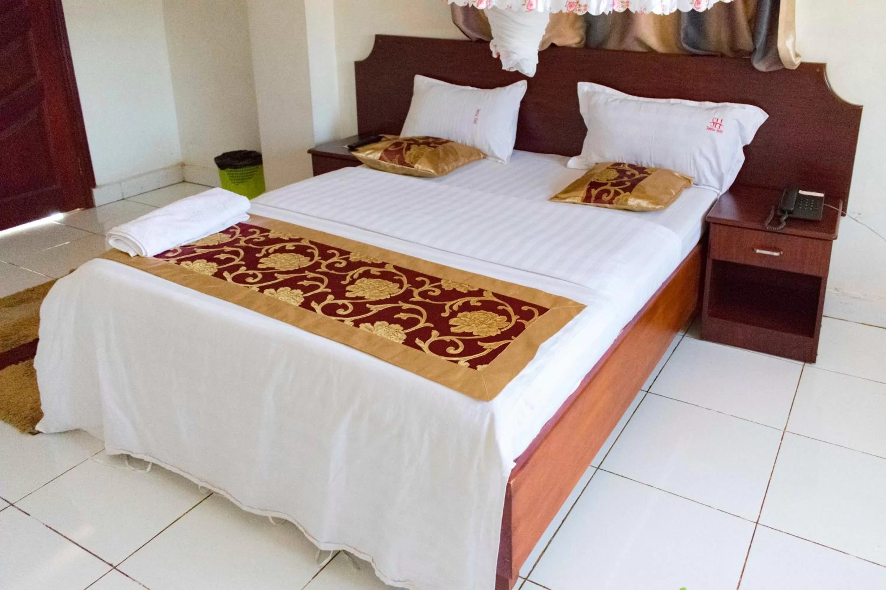 Bed in Sunrise Hotel Kampala