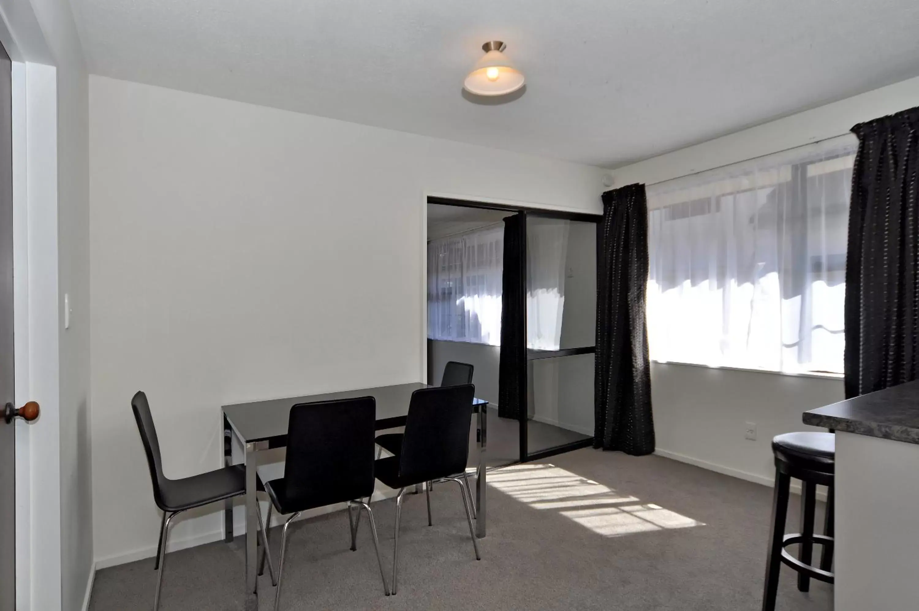 Living room in Metropolitan Motel on Riccarton