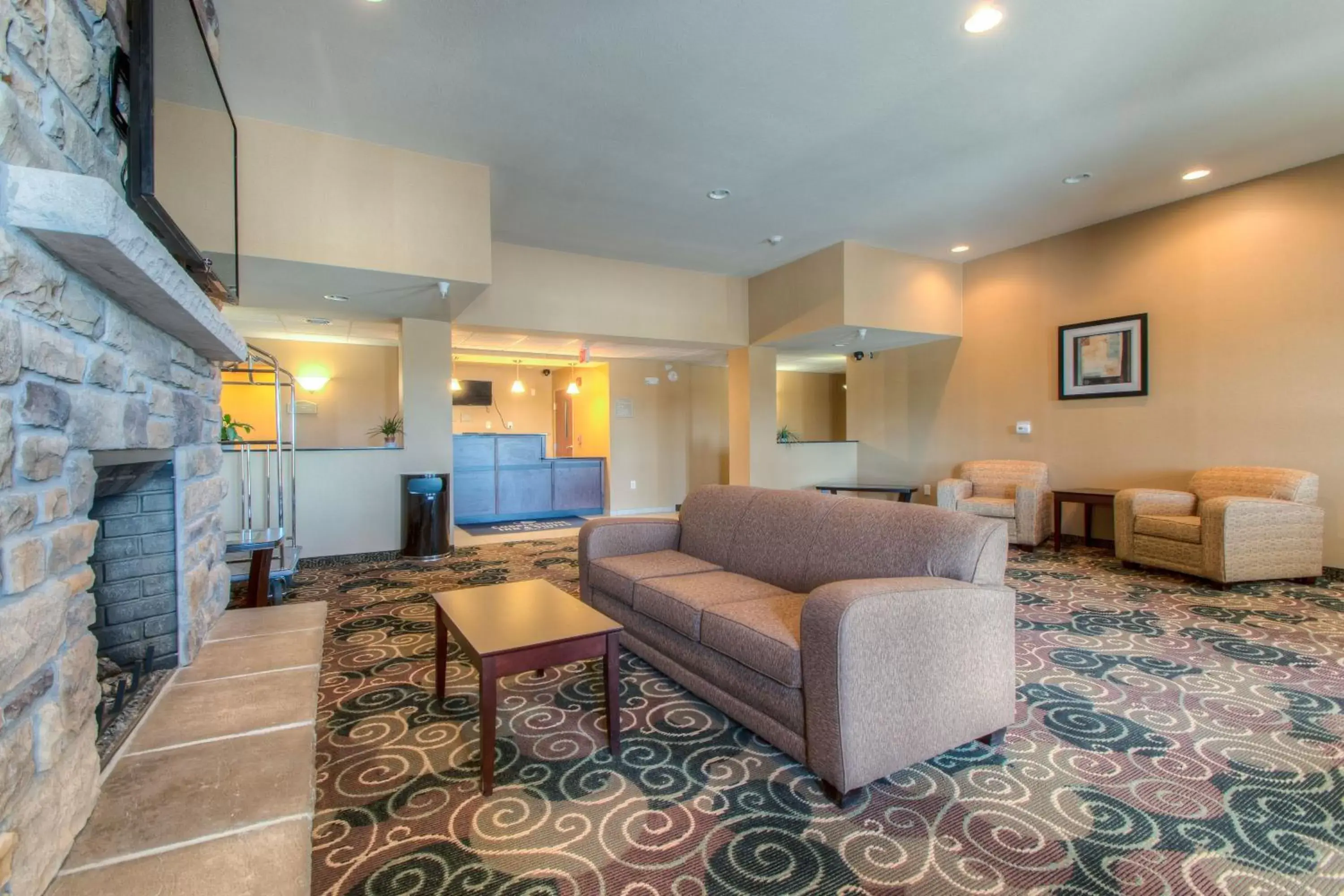 Communal lounge/ TV room, Seating Area in Cobblestone Inn & Suites - Wray