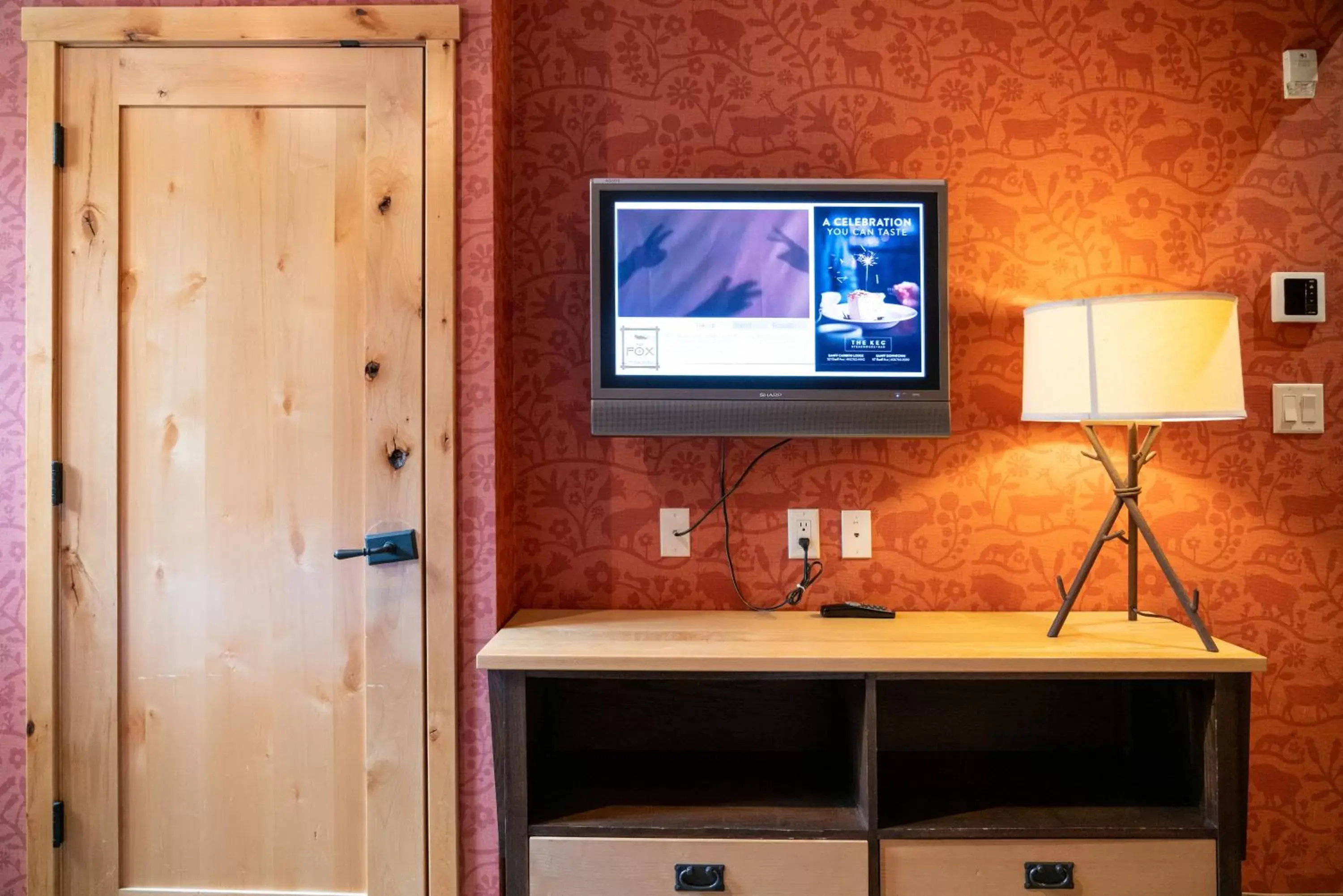 TV and multimedia, TV/Entertainment Center in Fox Hotel and Suites