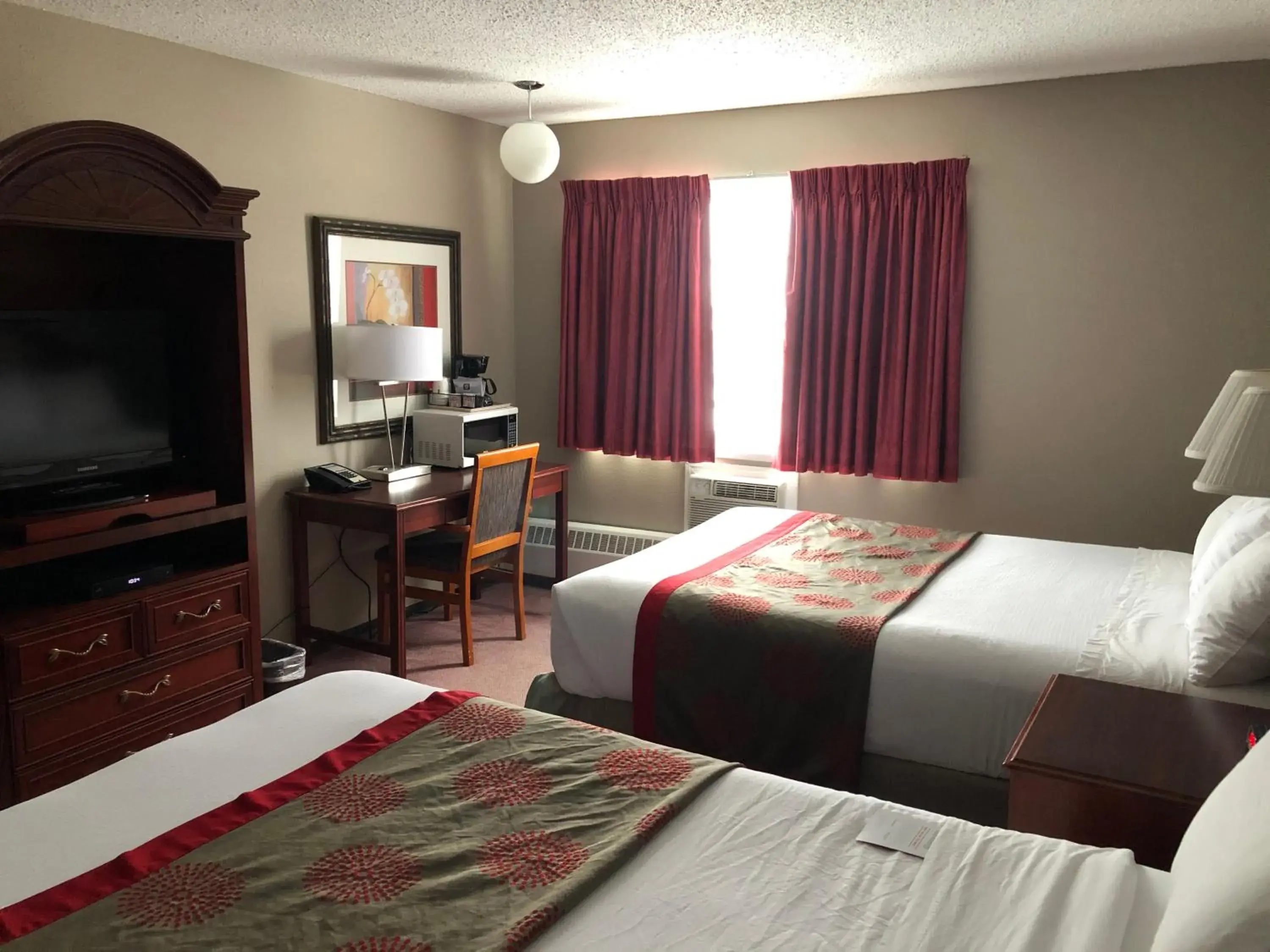 Photo of the whole room, Bed in Ramada by Wyndham Prince Albert