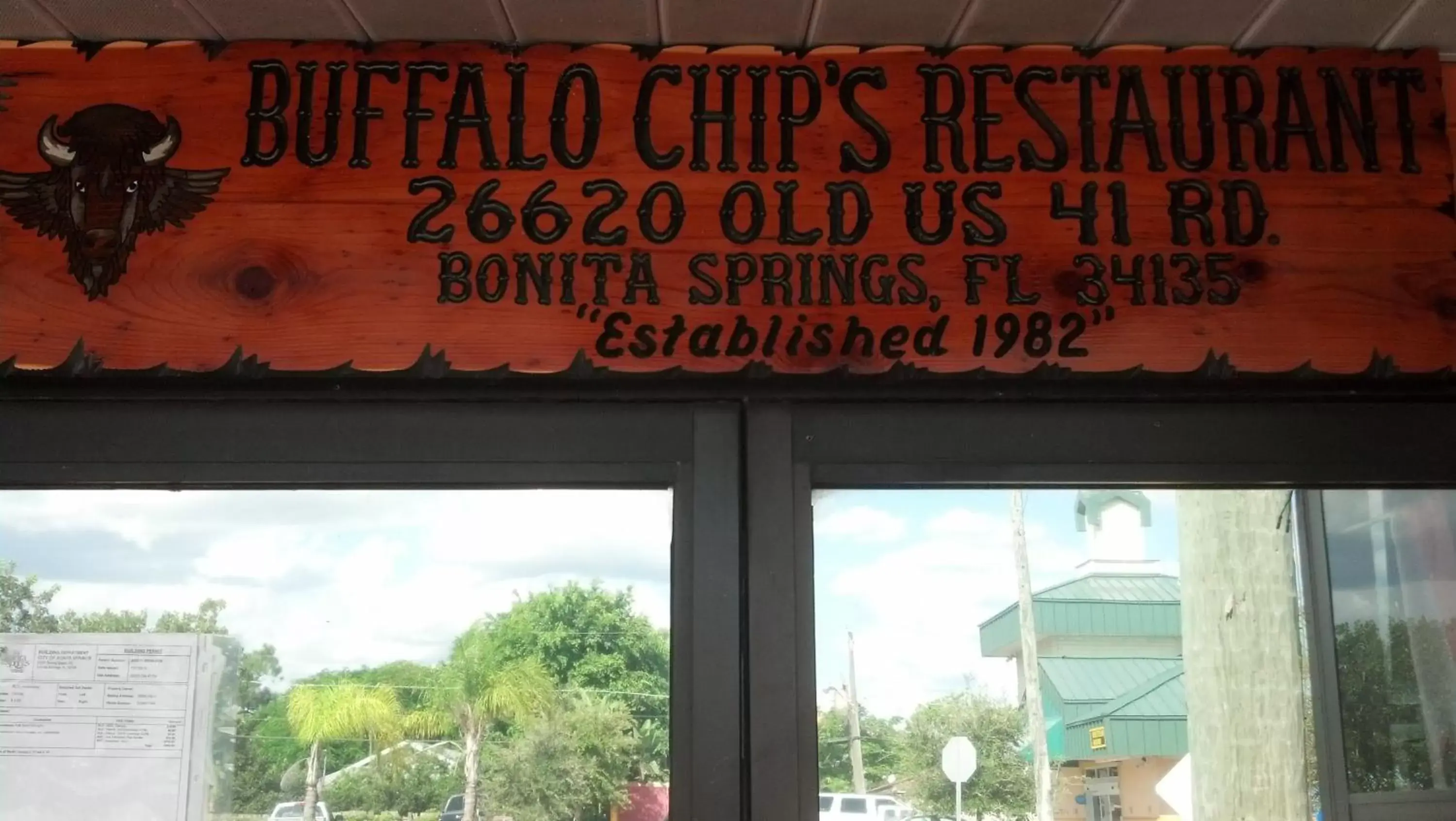 Logo/Certificate/Sign in Buffalo Chip's Ranch House Motel