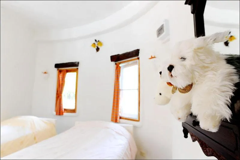 Bed in Scenic Riverside Resort