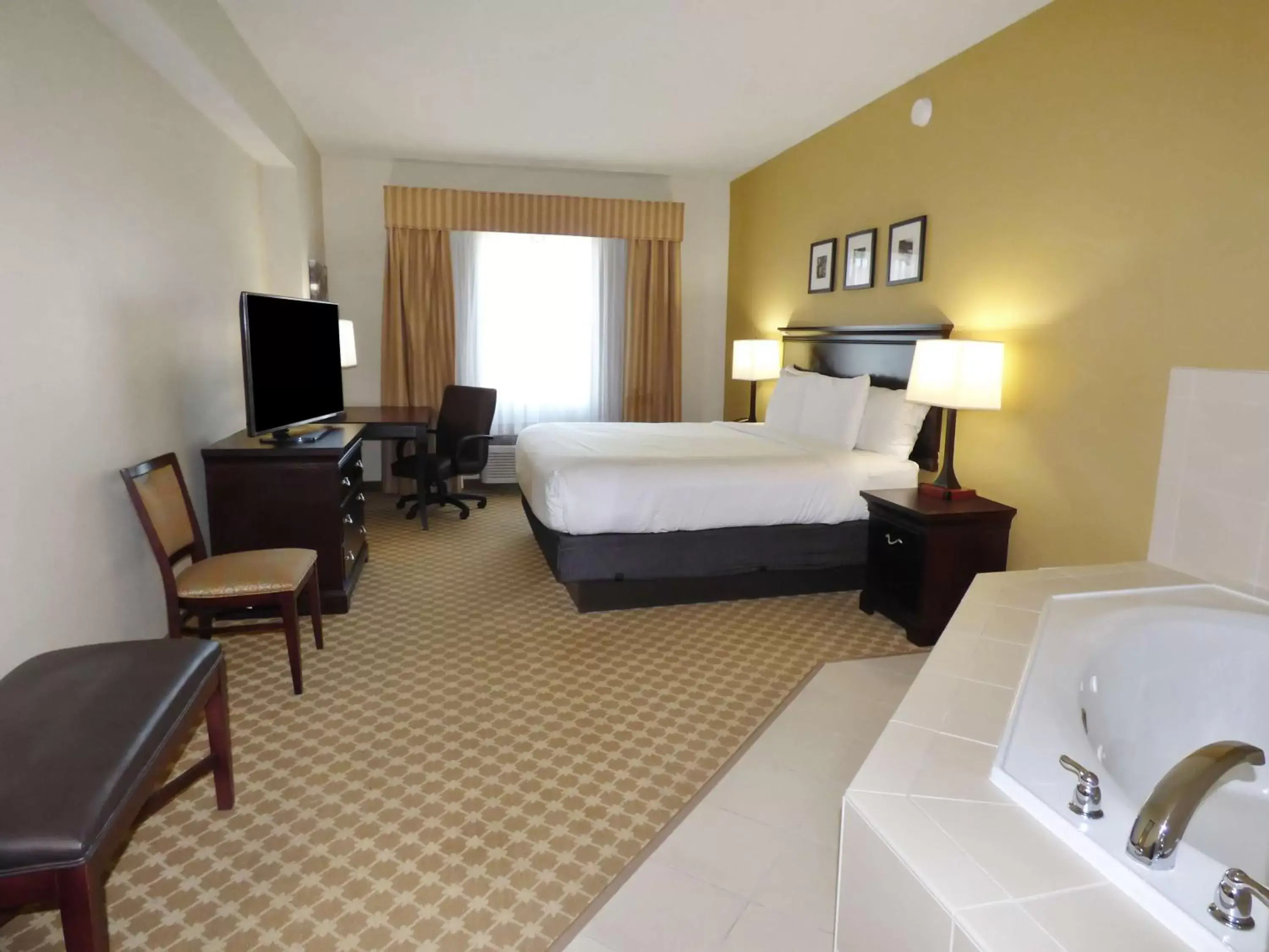 Photo of the whole room in Country Inn & Suites by Radisson, Port Orange-Daytona, FL