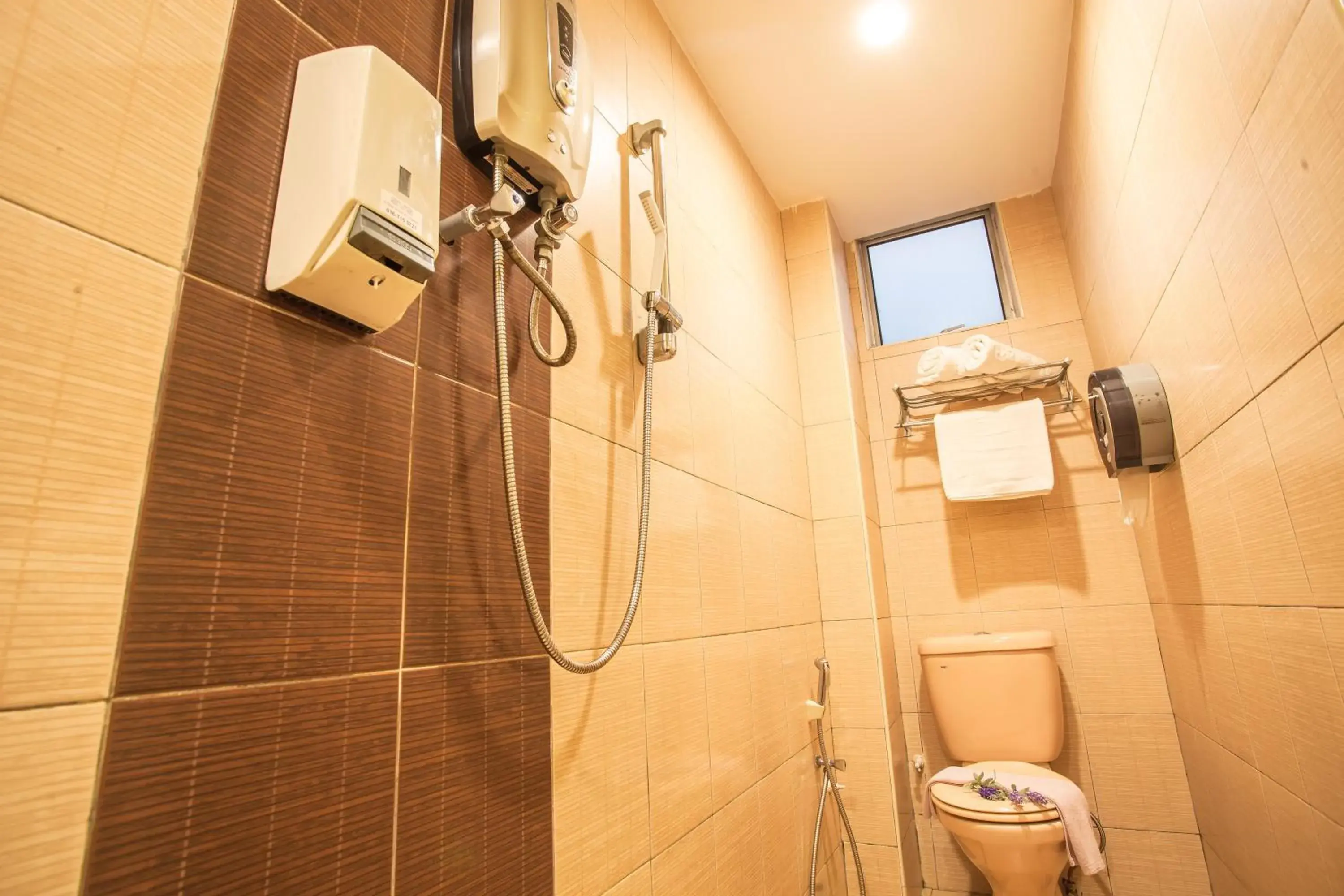 Toilet, Bathroom in Lavender Inn Nusa Bestari