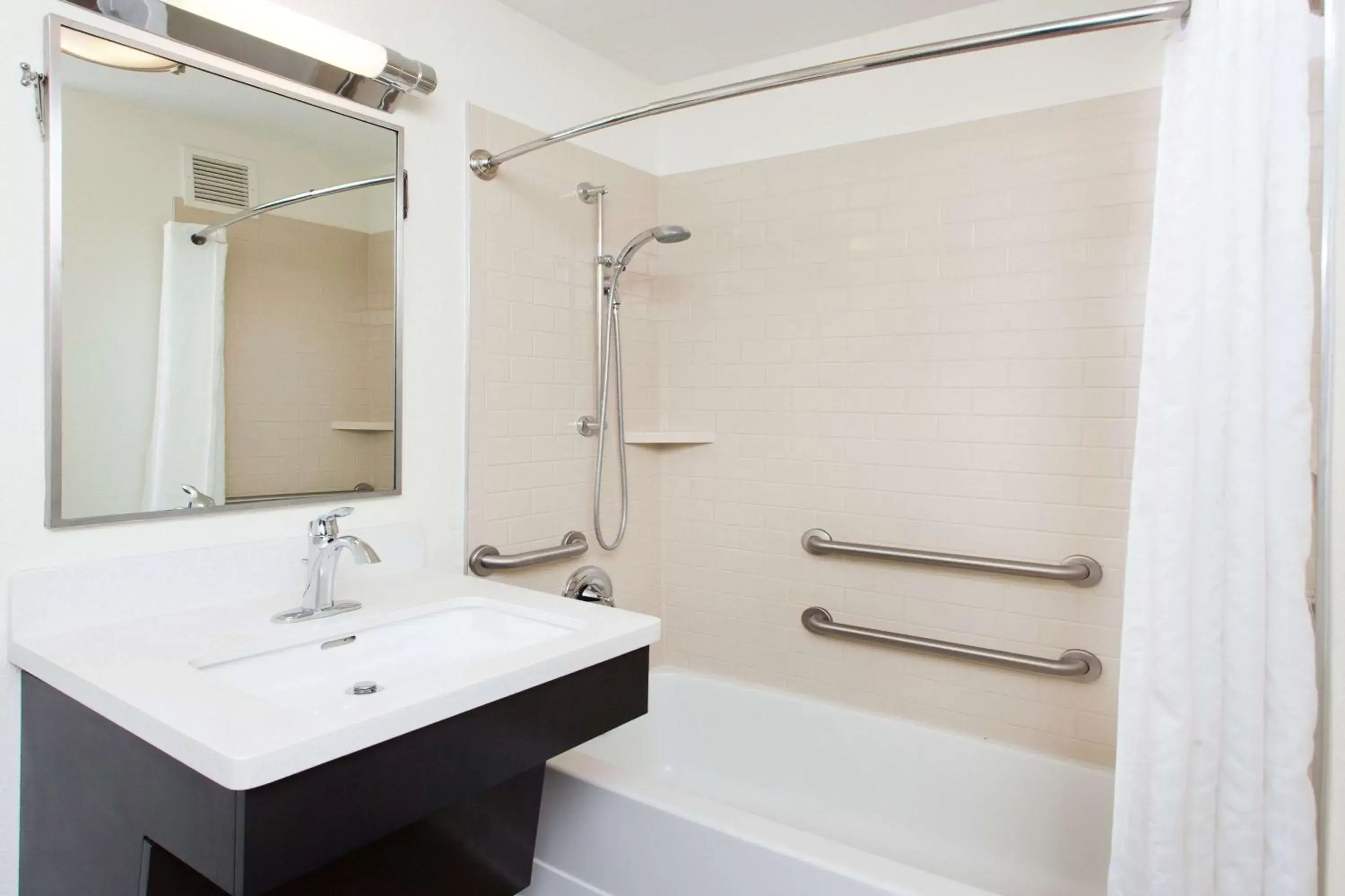 Bathroom in Sonesta Simply Suites Dallas Las Colinas Bathroom in Sonesta Simply Suites Dallas Las Colinas