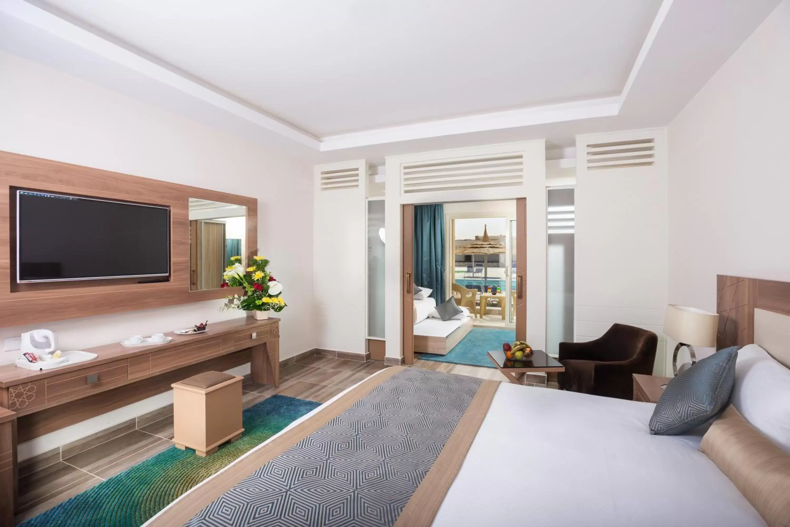 Bedroom, TV/Entertainment Center in Pickalbatros Aqua Park Sharm El Sheikh