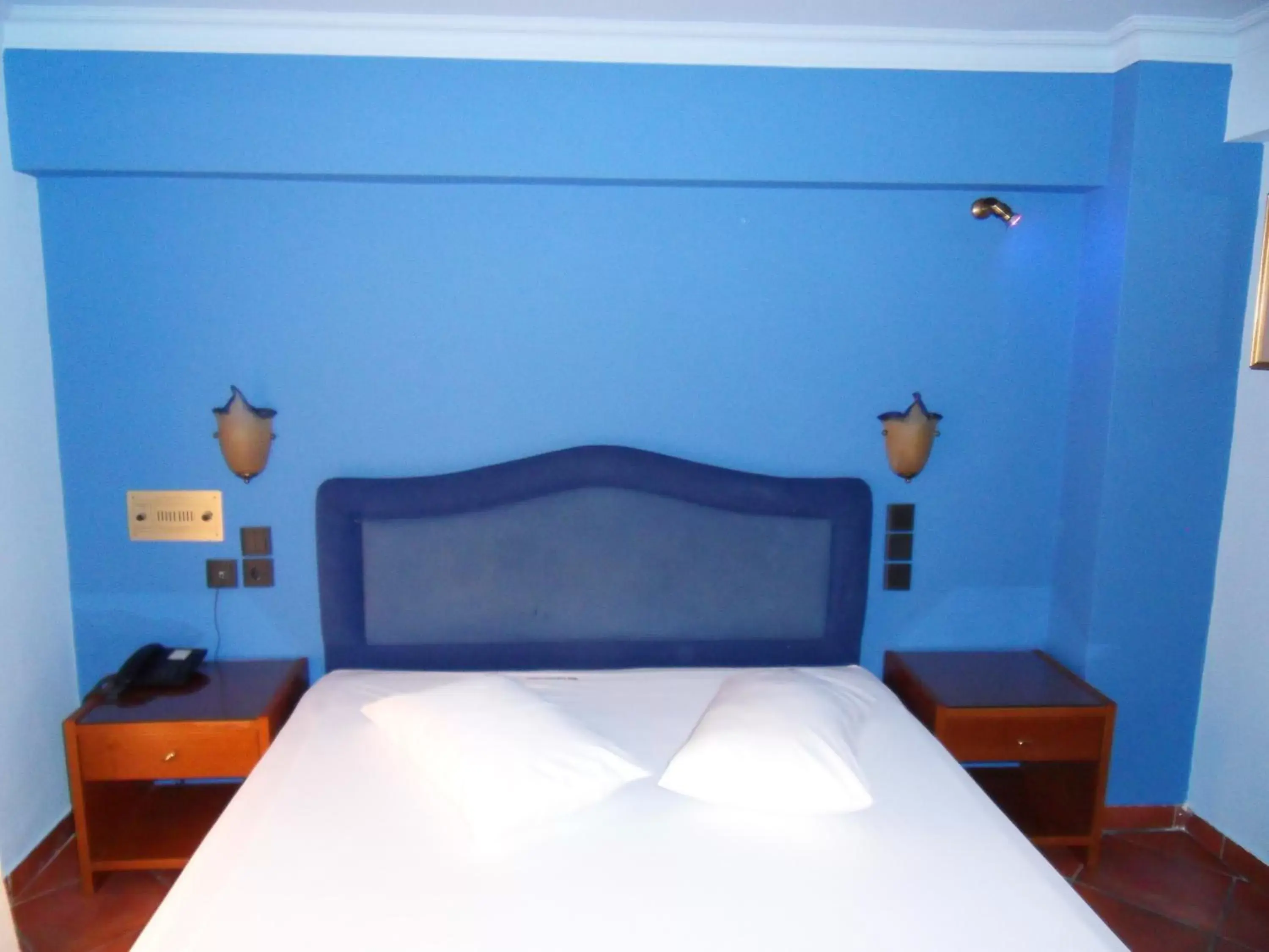 Bed in Alfa Hotel