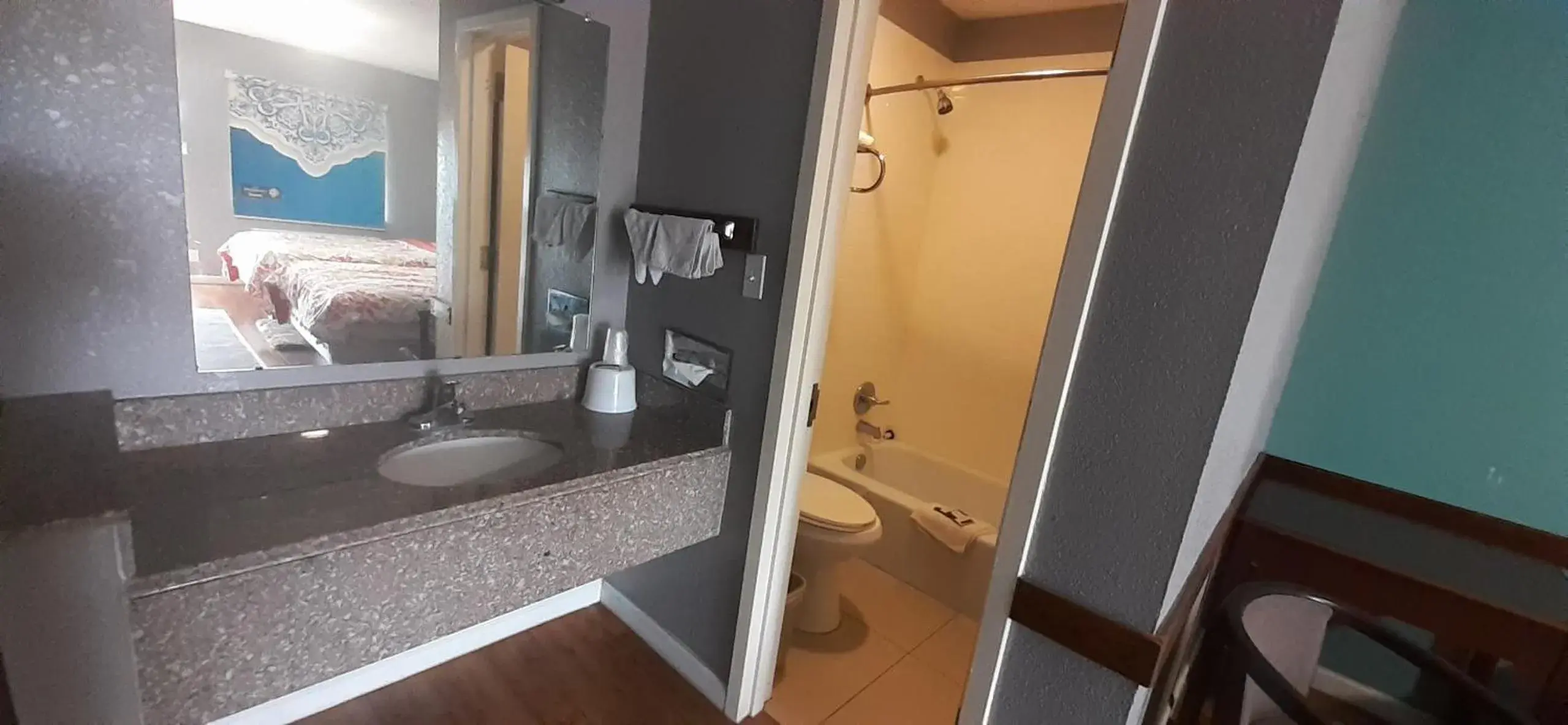 Bathroom in Woodfield Inn and Suites