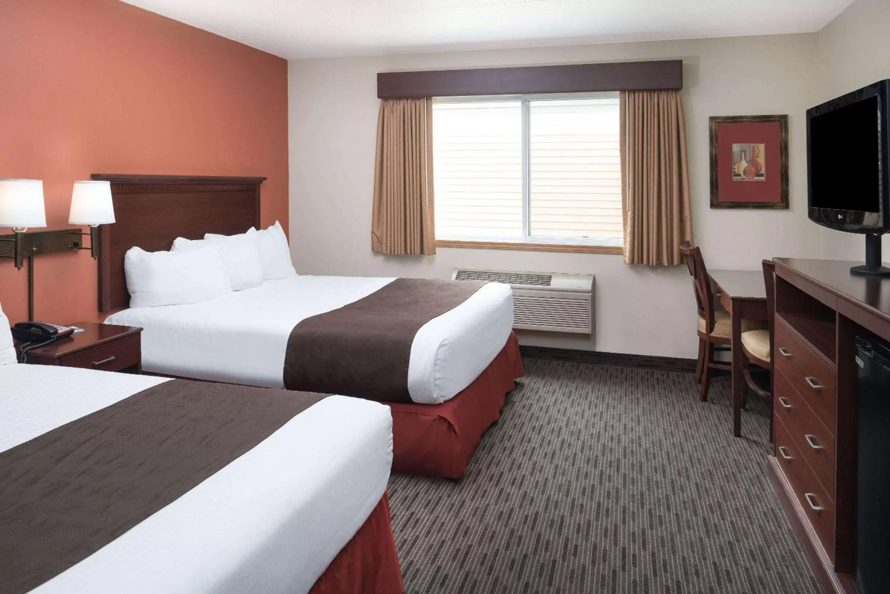 Queen Room with Two Queen Beds - Pet Friendly/Non-Smoking in AmericInn by Wyndham Valley City Conference Center