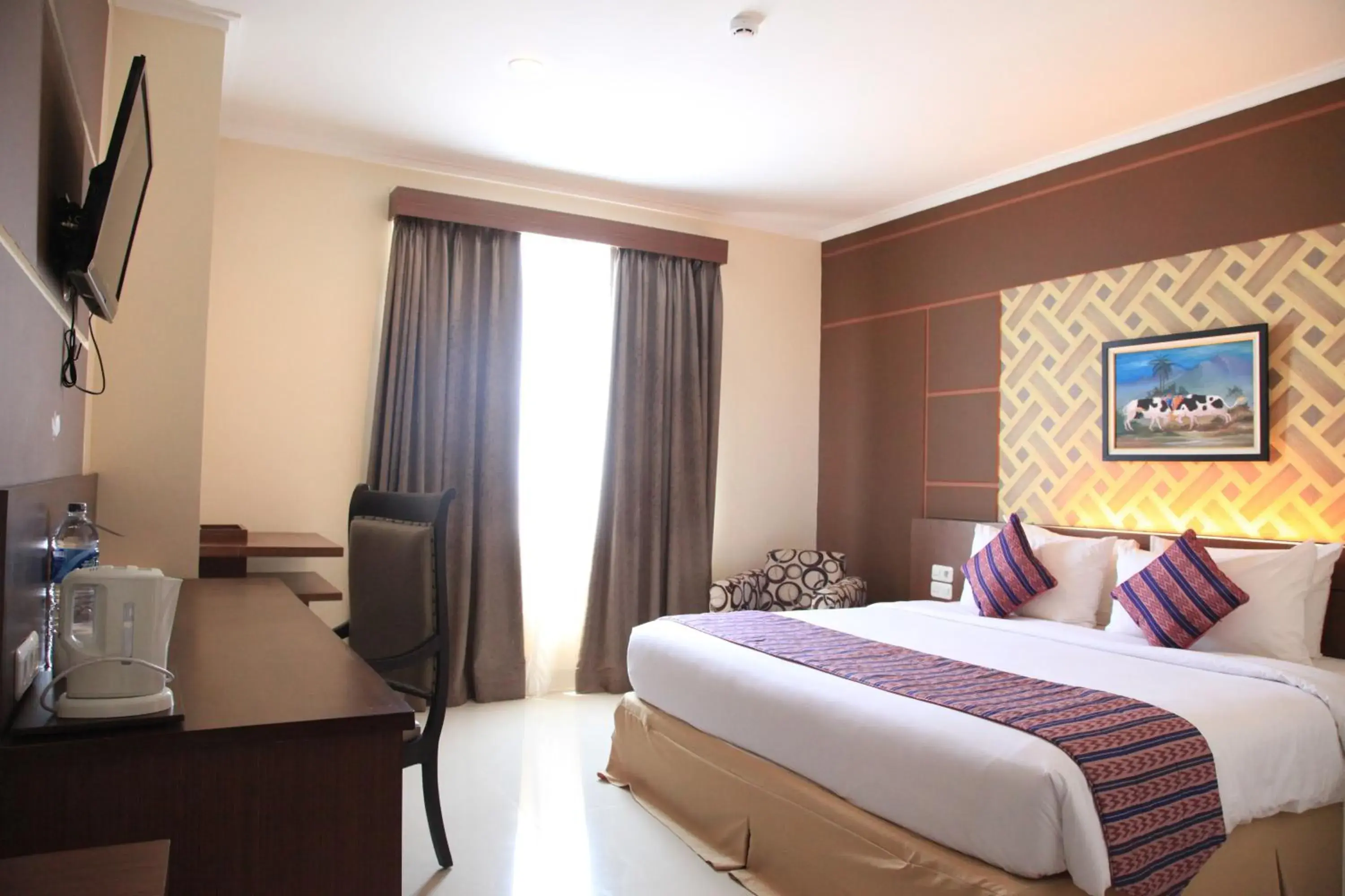 Bed in Aerotel Smile Losari Bed in Aerotel Smile Losari