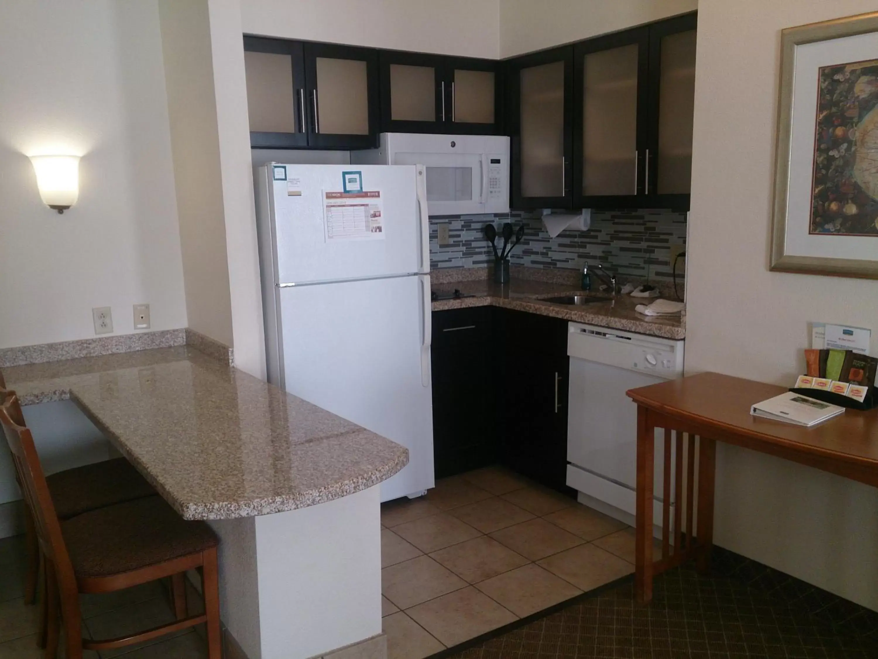 Photo of the whole room, Kitchen/Kitchenette in Staybridge Suites Columbus-Airport, an IHG Hotel