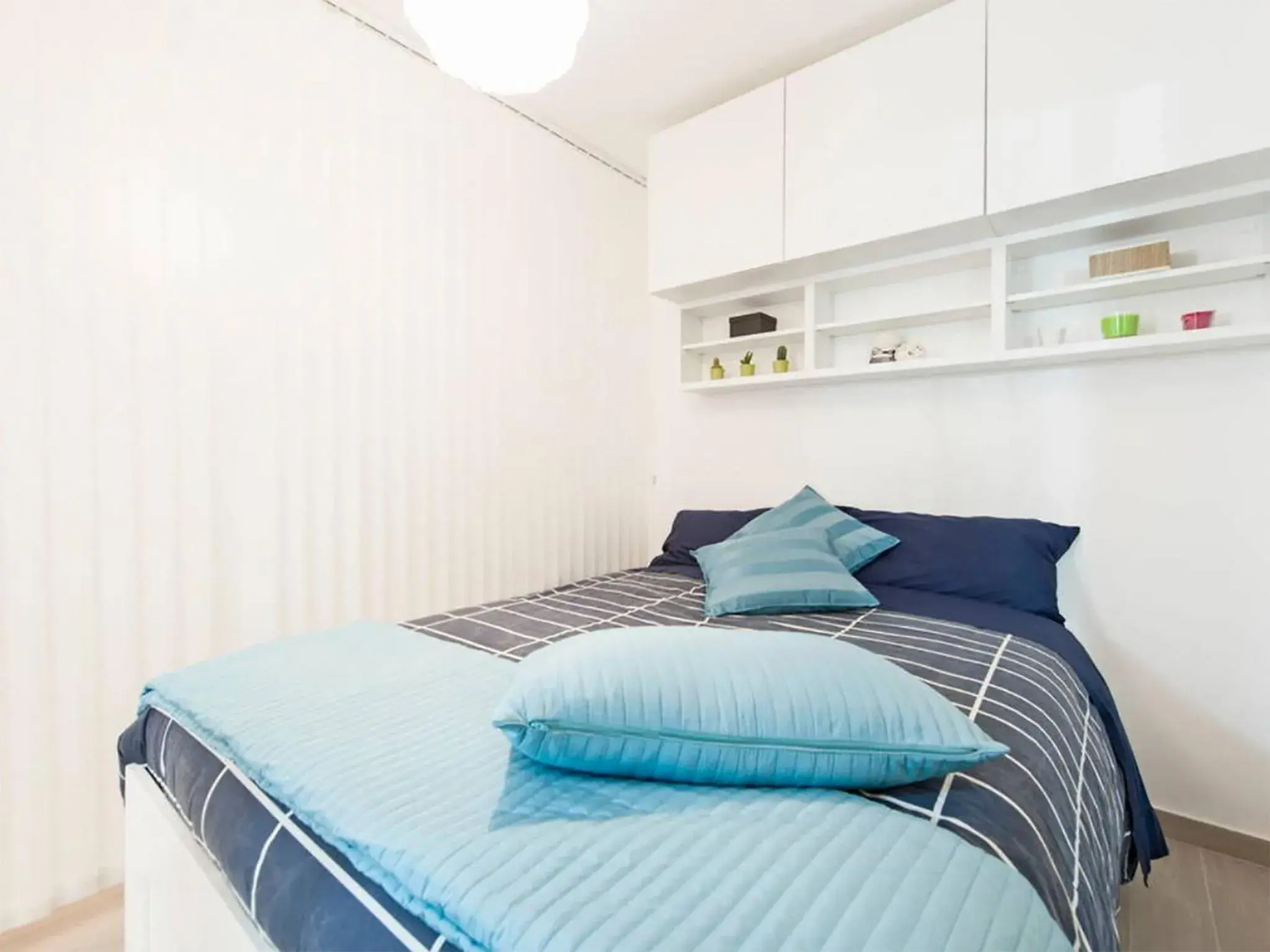 Bed in Condotti Apartment