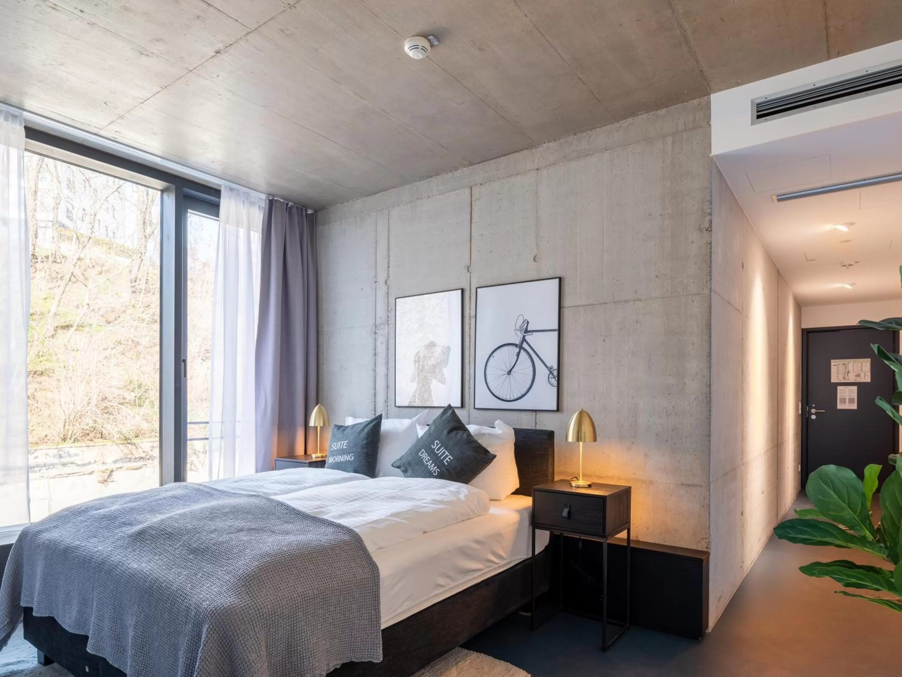 Bed in Limehome Erfurt Maximilian Welsch Str