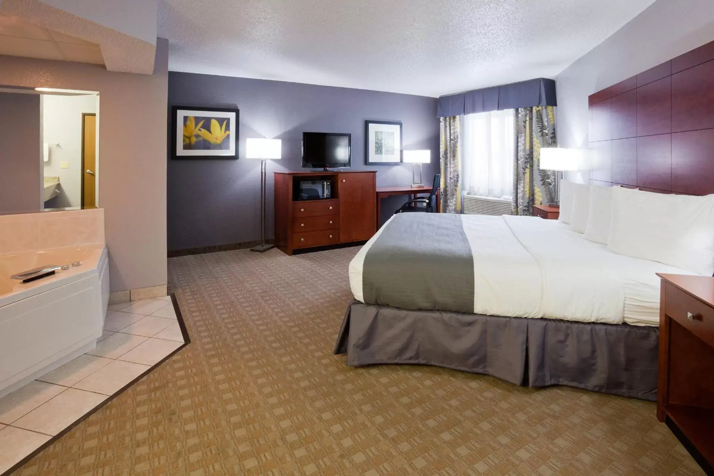 Guests in AmericInn by Wyndham Ankeny/Des Moines