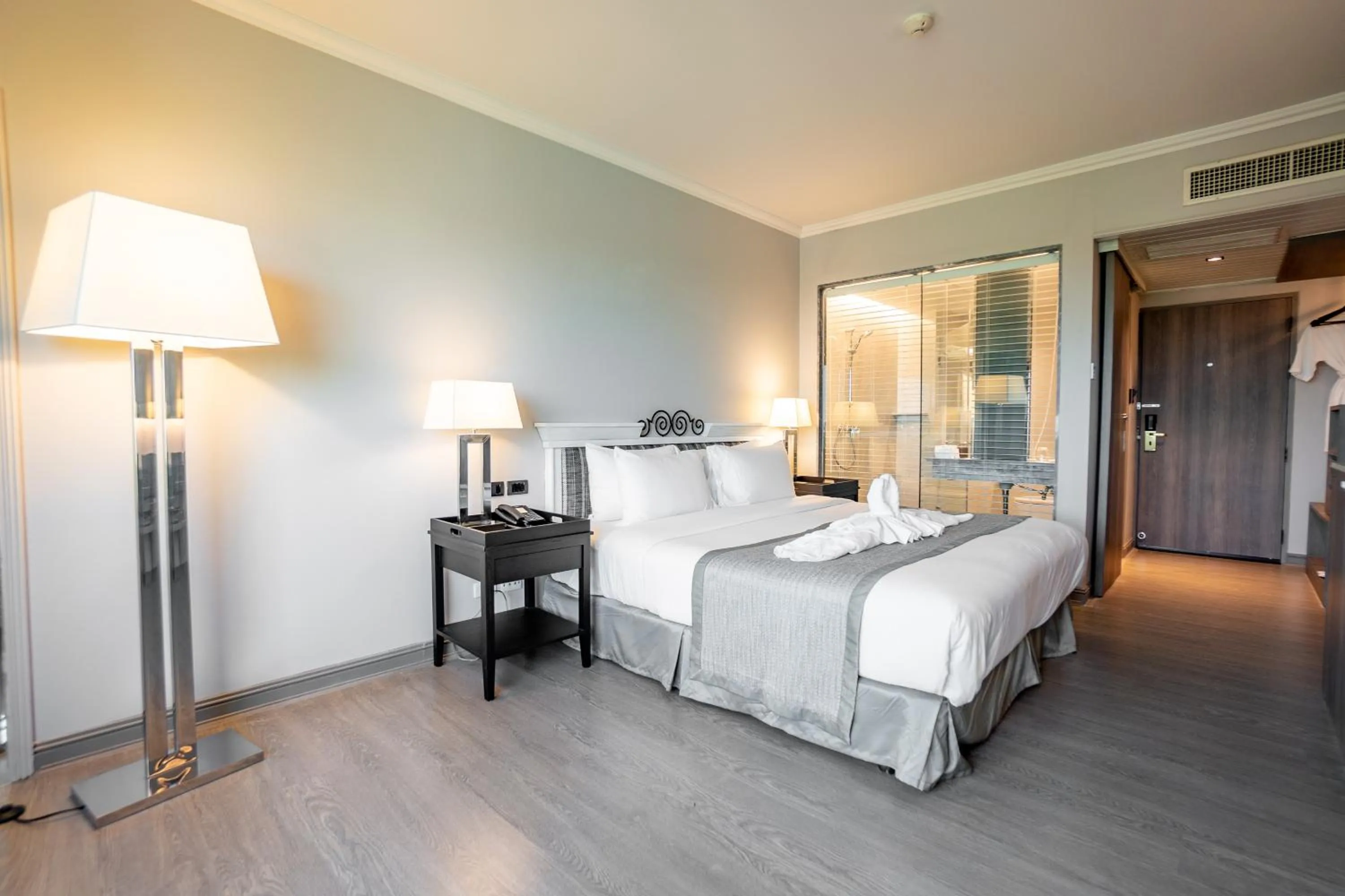 Bed in The Grand Riverside Hotel