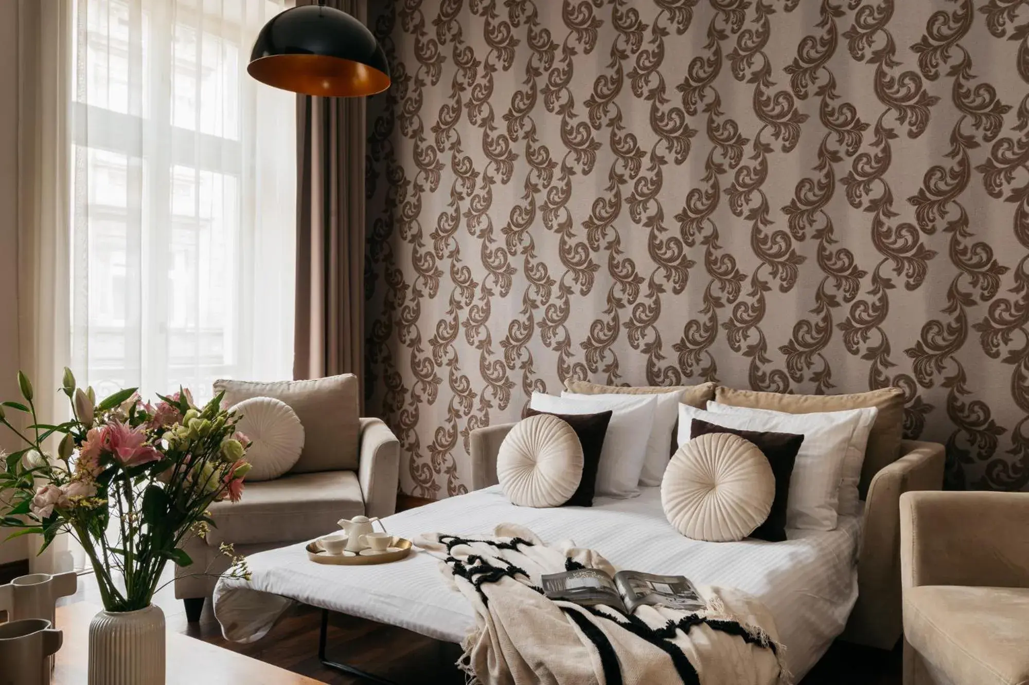 Bed, Seating Area in Topolowa Residence