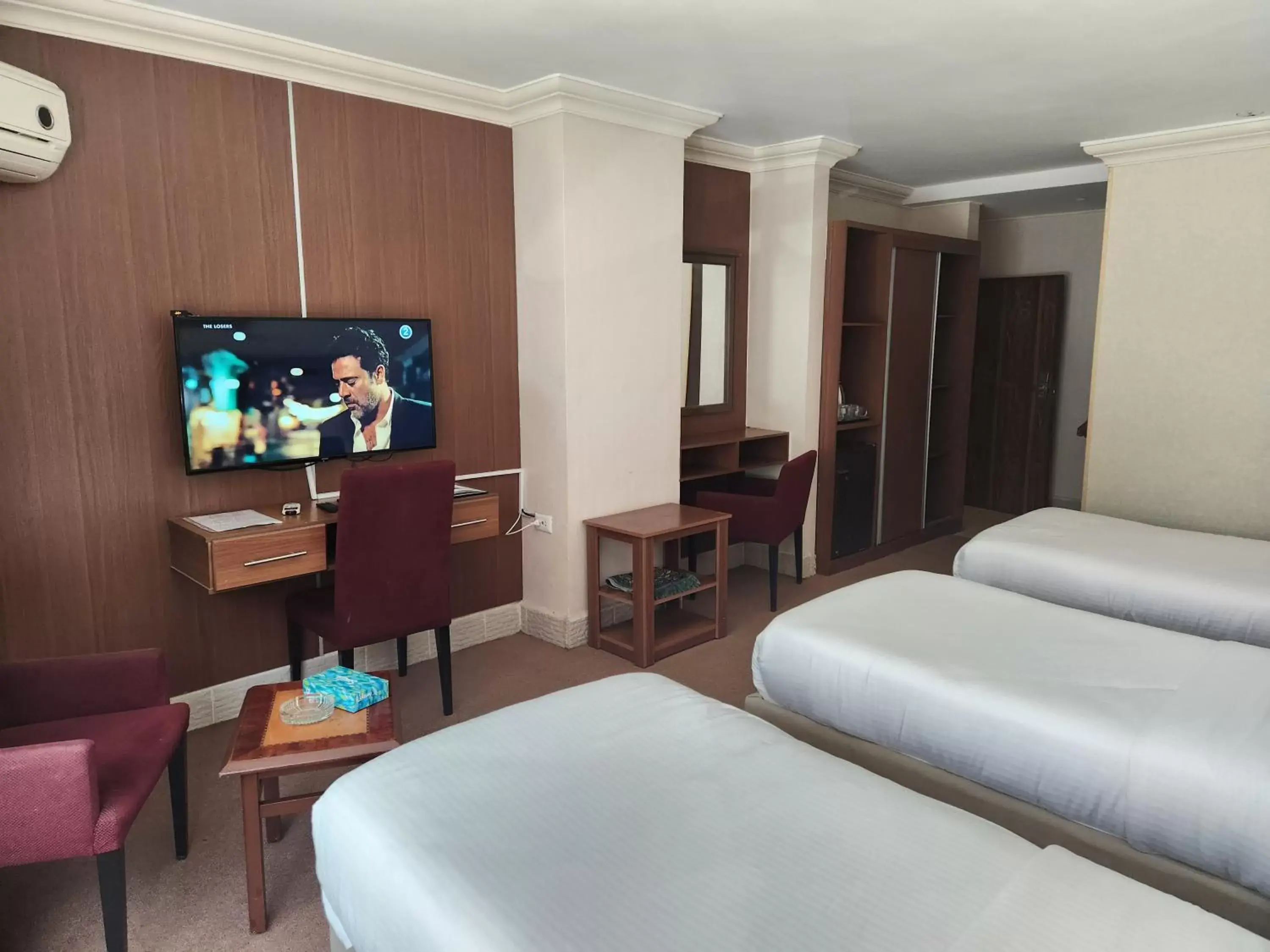 Bedroom, TV/Entertainment Center in Amman Orchid Hotel