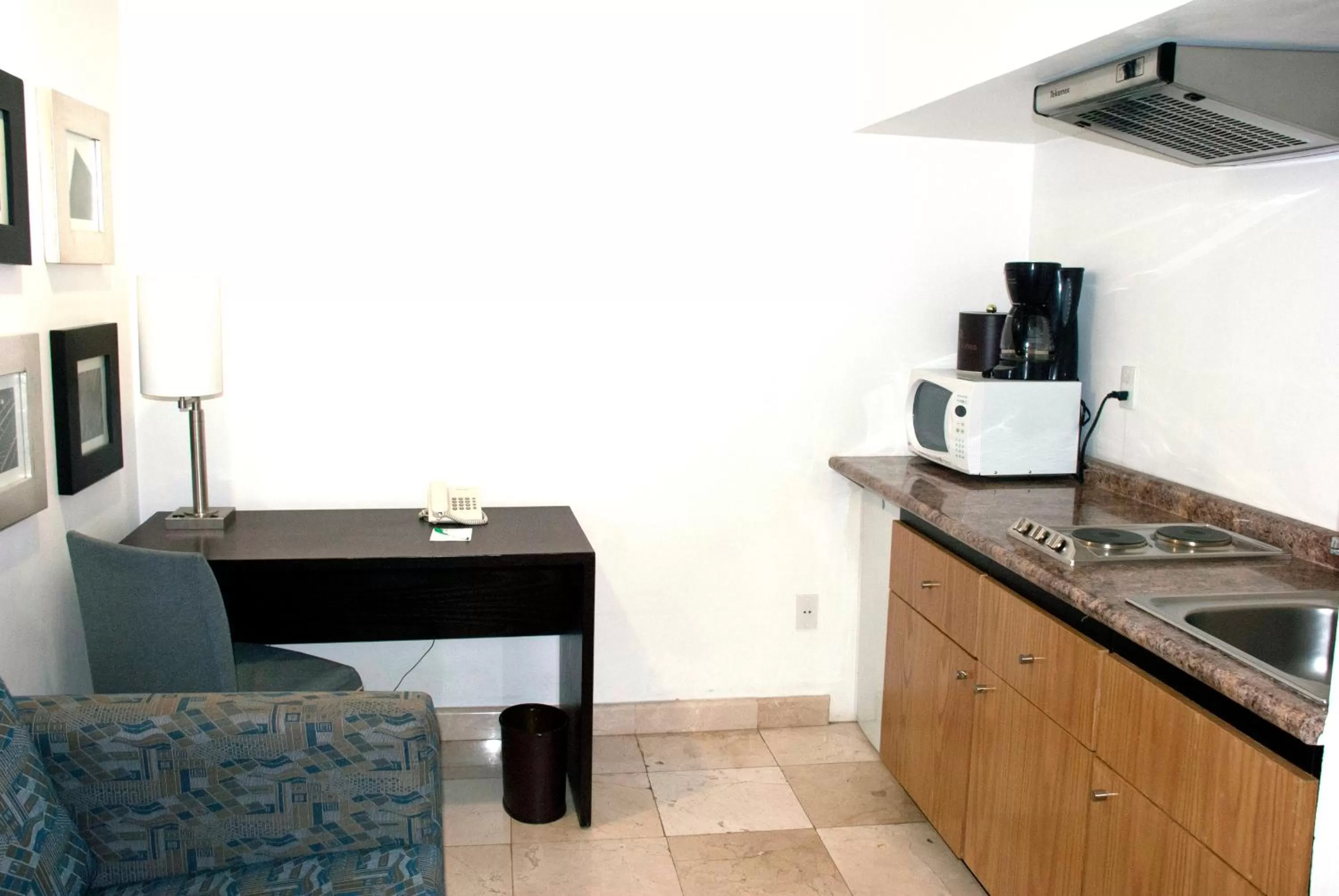 Kitchen or kitchenette in Hotel & Suites PF