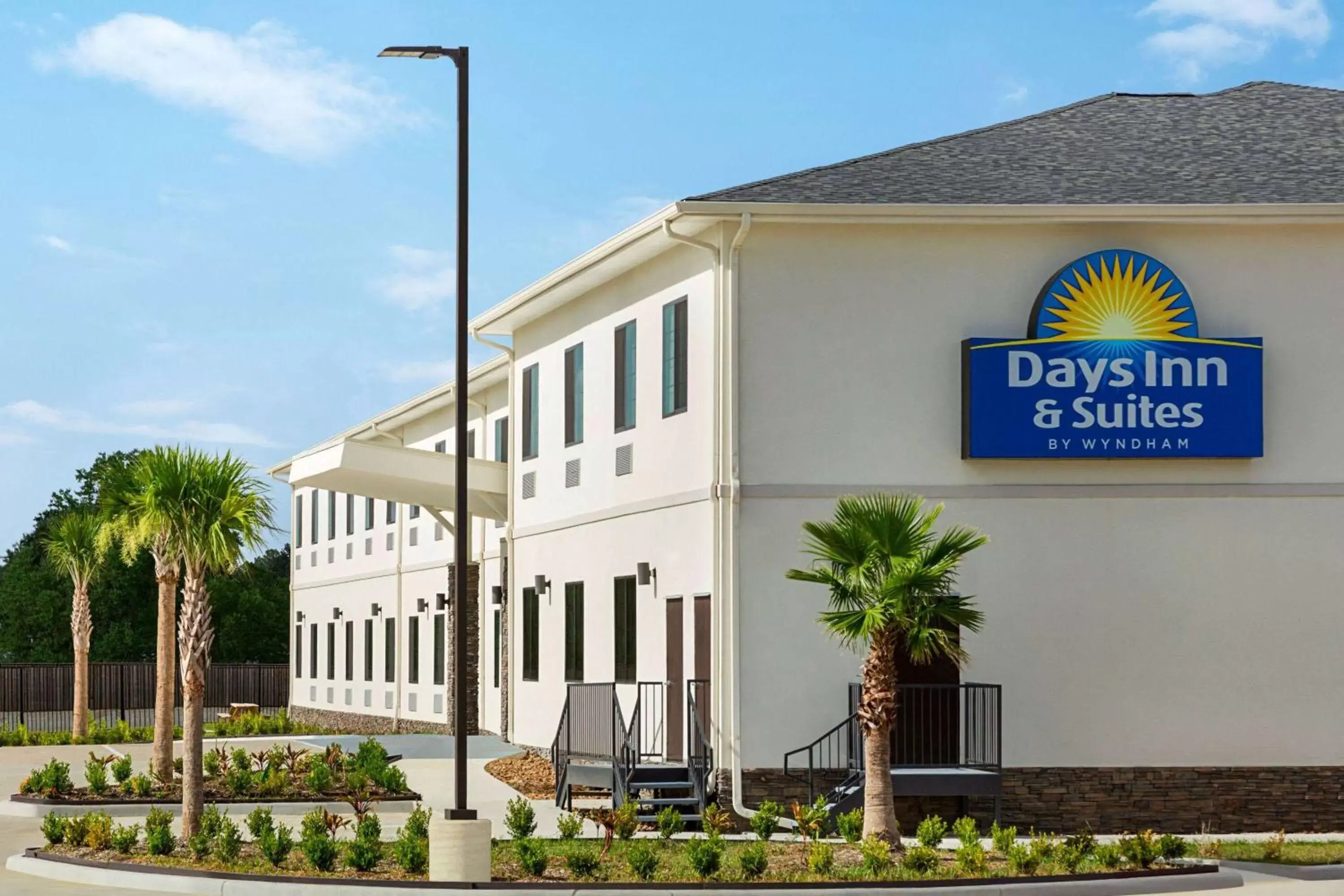 Property building in Days Inn & Suites by Wyndham Greater Tomball Property building in Days Inn & Suites by Wyndham Greater Tomball