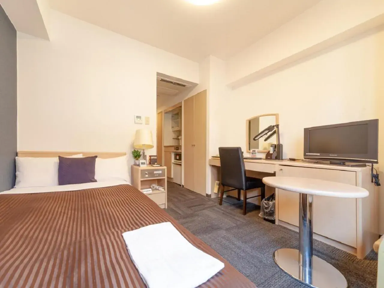 Bed in HOTEL LiVEMAX BUDGET Shinbashi Bed in HOTEL LiVEMAX BUDGET Shinbashi