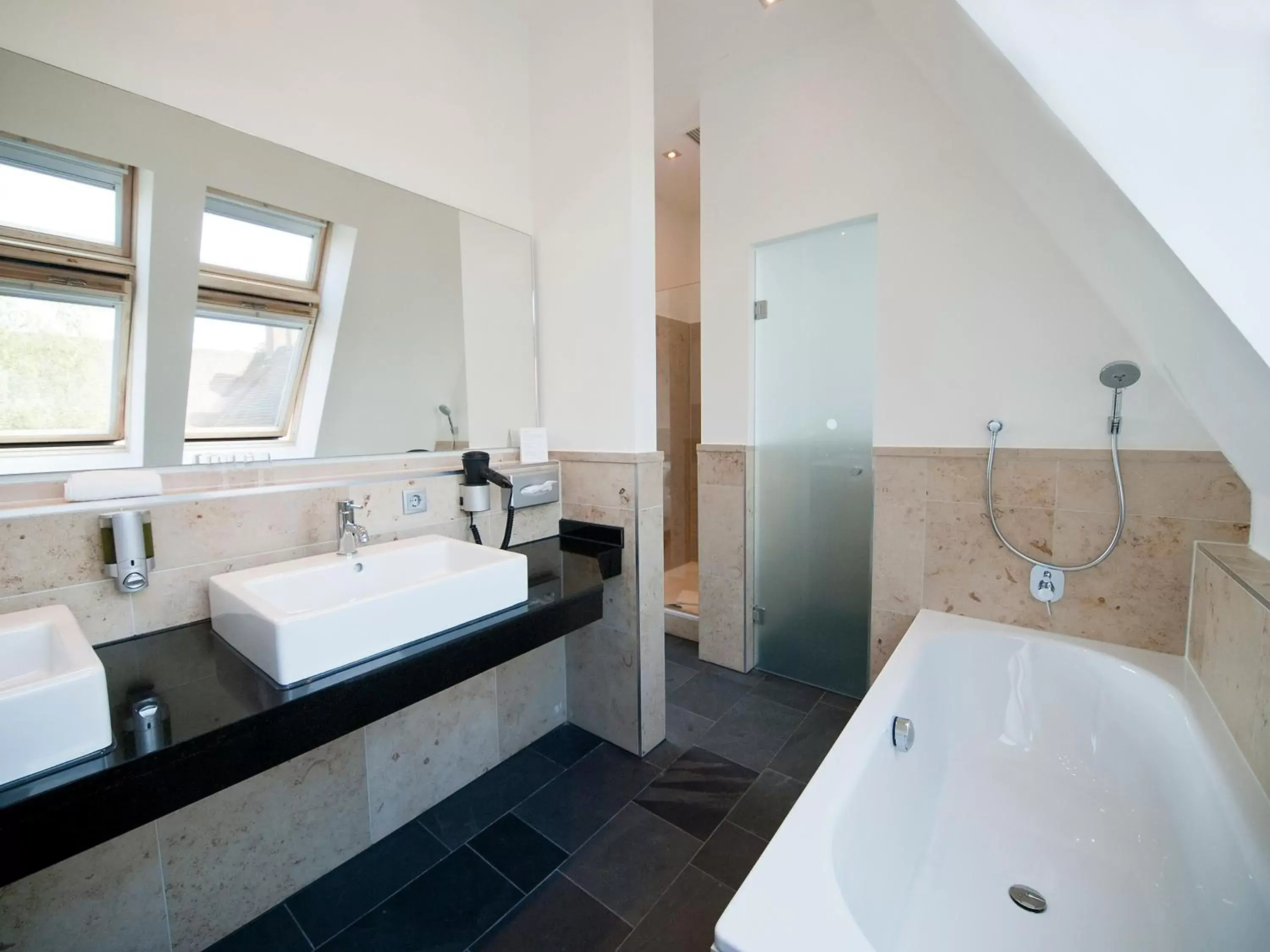 Bathroom in Qube Hotel Bergheim